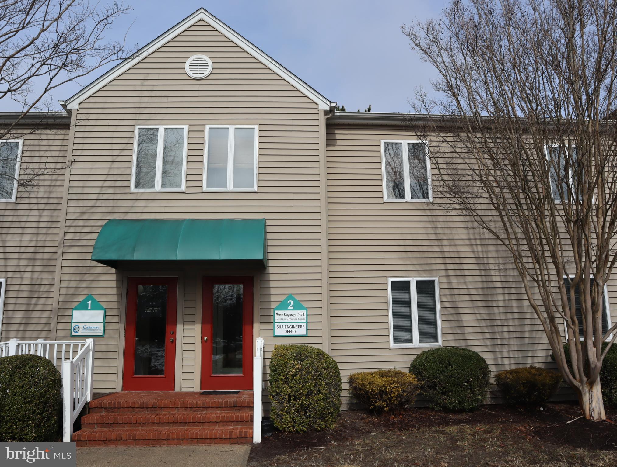 Suite 2B is an attractive second floor office separated into 3 private offices with a small reception area, two restrooms (one with a shower), small kitchenette, a storage closet plus a balcony adjacent to the rear office.  Fully carpeted and freshly painted.  There is also a floored attic for additional storage if needed. Beaglin Park Plaza is an attractive, well maintained professional center conveniently located at the intersection of Mt Hermon Road,  Beaglin Park Drive and US 50 Business.  Plenty of free, convenient parking  parking close to the front door.The monthly rent includes the condo fees, providing water, sewer & trash removal and all exterior maintenance, as well as property taxes.  Tenant responsibilities include electric, cable/internet/phone and routine interior maintenance.