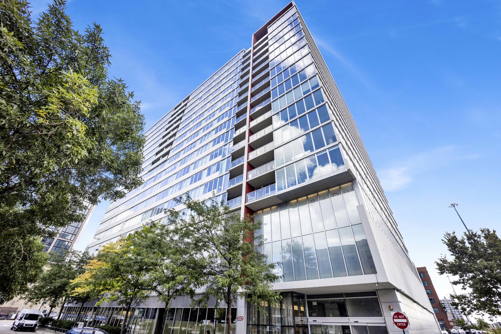 One of the most sought after 2 bed, 2 bath southeast corner units in the building! Floor-to-ceiling windows showcase stunning city views in this spacious layout with light hardwood floors, a large open-concept living area, and king-sized primary suite. Features include a sleek European kitchen with island, granite counters, and stainless appliances, plus custom closets, in-unit laundry, and a large private balcony. This full-amenity building offers 24-hr door staff, pool, sundeck, gym, and dog run-all just steps from world-class dining, shops, transit, and more. Two prime, heated/indoor deeded parking spots available for $30K each.