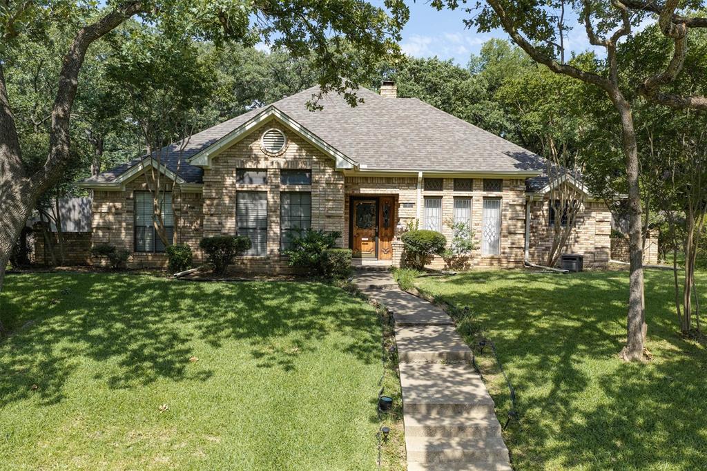 Cozy, single story home on almost half of an acre, a treed lot, with a pool in the heart of Keller!  This home sits up on a small hill in a fantastic location within the City of Keller.  Wonderfully mature neighborhood.  Large lot!  This home has great curb appeal with the driveway to the right of the home leading to a side entry garage toward the back of the house.  Large living room with taller ceiling and cozy brick fireplace.  Formal dining and breakfast area in the kitchen.  Second living room with large windows leading to treed backyard and porch. 1 bedroom and full bathroom on one side of the home with 3 other bedrooms on the opposite side of the house.  Pool gets lots of shade in the summer.  Storage shed in the backyard. Excellent floorplan, tons of space, well maintained.  Keller ISD. Roof approximately 4 years old.  Sprinkler system recently repaired.