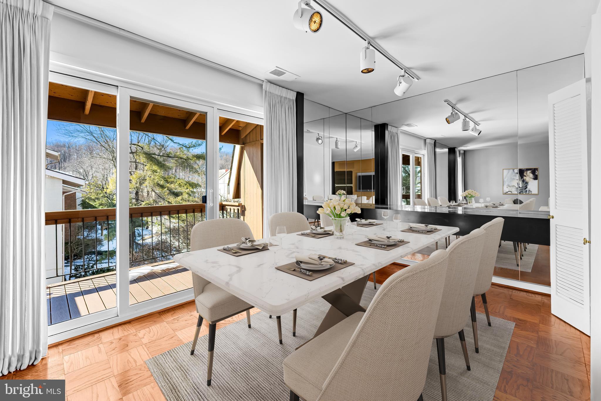 Serene & Peaceful Treehouse!   Enjoy sunsets and treetop views from this 2 bedroom 2 bath home.  Miele washer / dryer in unit and one bedroom has been turned into a den / office with blt-in bookshelves and desk.  Perfect for remote workers. This  home has been well maintained and has a warm vibe with a newer, insulated sliding glass door to deck & recent HVAC system. Come and enjoy all that Cross Keys has to offer including trendy restaurants and coffee shops, boutiques, pilates, pickleball, tennis and  3 outdoor pools.  Water (including hot water) is included in your condo fee.  This gated community is perfectly located right off of 83 for your convenience!