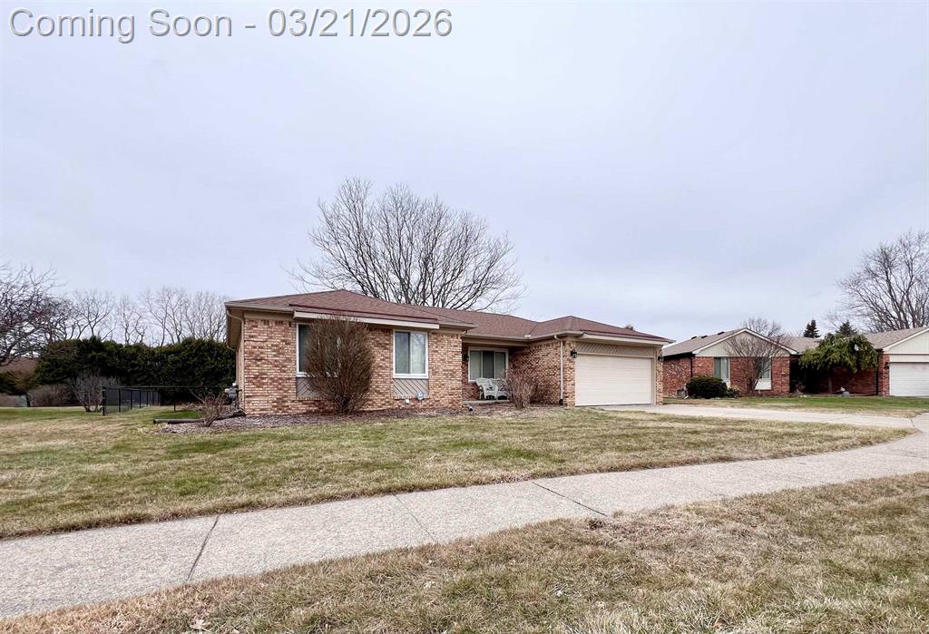 Prime Location! The home's cul-de-sac location is a secluded location offering a more peaceful setting! Full brick ranch with attached 2 car garage! Automatic opener and side access door to backyard. It is move in ready. It is walking distance of the Clinton-Macomb Public Library (Main Branch) and the surrounding civic campus. So much to enjoy there! The interior has many updates. Gorgeous flooring and trim! Custom hand-shaven hardwood floors run through the great room and hallway, complemented by upgraded white trim, 6-panel doors, and new interior hardware. Kitchen has a modernized feel with walnut-stained wood cabinets, neutral ceramic tile, and a newer Frigidaire Gallery stainless steel appliance package, including a 5-burner gas stove! Enjoy entertaining here! Door wall off the eating area to cement patio and the oversized fenced yard! Open layout with great room featuring a fireplace and a custom 7 ft long wood mantel. You will love these hardwood floors! Three generously sized bedrooms and two full baths! The primary bedroom includes a doorwall to backyard and shared access to a full bath. Double wide closets. All bedrooms have ceiling fans. White faux blinds throughout. Painted in 2024. Knockout finished basement! Entertainment ready! A stunning, spacious family room with new plush light grey carpeting! Home office includes a dedicated office space, perfect for remote work or it can be a great gaming room. 2nd full bathroom featuring a tiled floor & walk-in tiled shower! You will love the staircase! Updated with an open design, hanging light fixture and modern black iron spindles. Very nice outdoor living space! It has a fully fenced yard with a large cement patio and oversized wide yard. A double-door shed built on a solid cement foundation is perfect for outdoor games, equipment and tools. Fantastic curb appeal! Full brick exterior with a premium fiberglass wood-grain front door! Pella storm door & for the warm months, pop in the screen door. Covered front porch! System upgrade includes a newer furnace