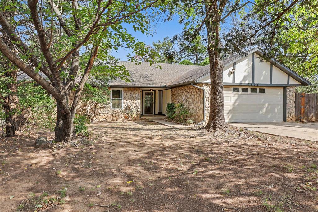Escape the restrictions with this solid rock home on a wooded acre. This home is a rare find combining country freedom with city convenience. Situated on a wooded lot of nearly an acre, in Logan County (with an Edmond Address) this property offers the ultimate canvas for your dream homestead. Best of all, it is unrestricted meaning no HOA, and outbuildings and shops are allowed. This solid rock construction offers unmatched character. The true crown jewel of this home is the expansive, light-filled sunroom that offers a panoramic window overlooking the private and serene wooded acre. It’s the perfect spot for morning coffee, an artist’s studio, or a peaceful second living space, complete with a mini-split. While the interior leaves room for your personal updates and modern touches, the foundational elements are solid. The property has been upgraded to a modern aerobic septic system, and the mechanical systems have been well maintained. Enjoy the quiet, peacefulness of rural Logan County and Logan County taxes, while located in Edmond School District, and remaining just minutes away from everything Edmond and North OKC have to offer. There is quick access to Covell and I-35 and all major thoroughfares for your drive into downtown OKC, or north to Guthrie. Whether you are looking to build a large workshop, park your recreational vehicles, or simply customize a solid home to match your style, this property is ready for its next chapter. (Washer, dryer and fridge to remain with acceptable offer.)