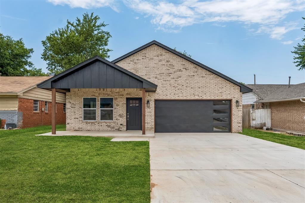 $7,000 IN BUILDER CONCESSIONS AVAILABLE for buyers to use toward upgrades or closing costs! This beautifully designed new construction home features 3 bedrooms, 2 bathrooms, a 2-car garage, and a spacious open-concept floor plan with modern finishes throughout. Standout curb appeal begins with a striking brick exterior accented by bold trim, natural wood beams, and contemporary lighting. Inside, wood-look luxury vinyl plank flooring flows throughout the entire home, so no carpet! The spacious living room features a sleek linear fireplace and opens seamlessly to the kitchen and dining areas, creating an ideal space for everyday living and entertaining. The kitchen features shaker-style cabinetry, quartz countertops, nickel hardware, stainless steel appliances, and a statement tile backsplash extending to the ceiling around the kitchen window. The private primary suite includes a stylish accent wall, modern bedside sconces, and a spa-inspired primary bathroom with dual quartz vanities, an LED-lit mirror, freestanding soaking tub, and oversized walk-in shower featuring floor-to-ceiling tile and a rainfall showerhead. The large walk-in closet includes built-in shelving for additional storage. Two additional bedrooms share a beautifully finished full bathroom with a tiled tub surround and Delta fixtures. A generously sized laundry room adds even more everyday functionality. With modern finishes, an open floor plan, no carpet, and $7,000 in builder concessions available toward buyer upgrades or closing costs, this move-in-ready new construction home offers style, functionality, and added value. Schedule your private showing today!