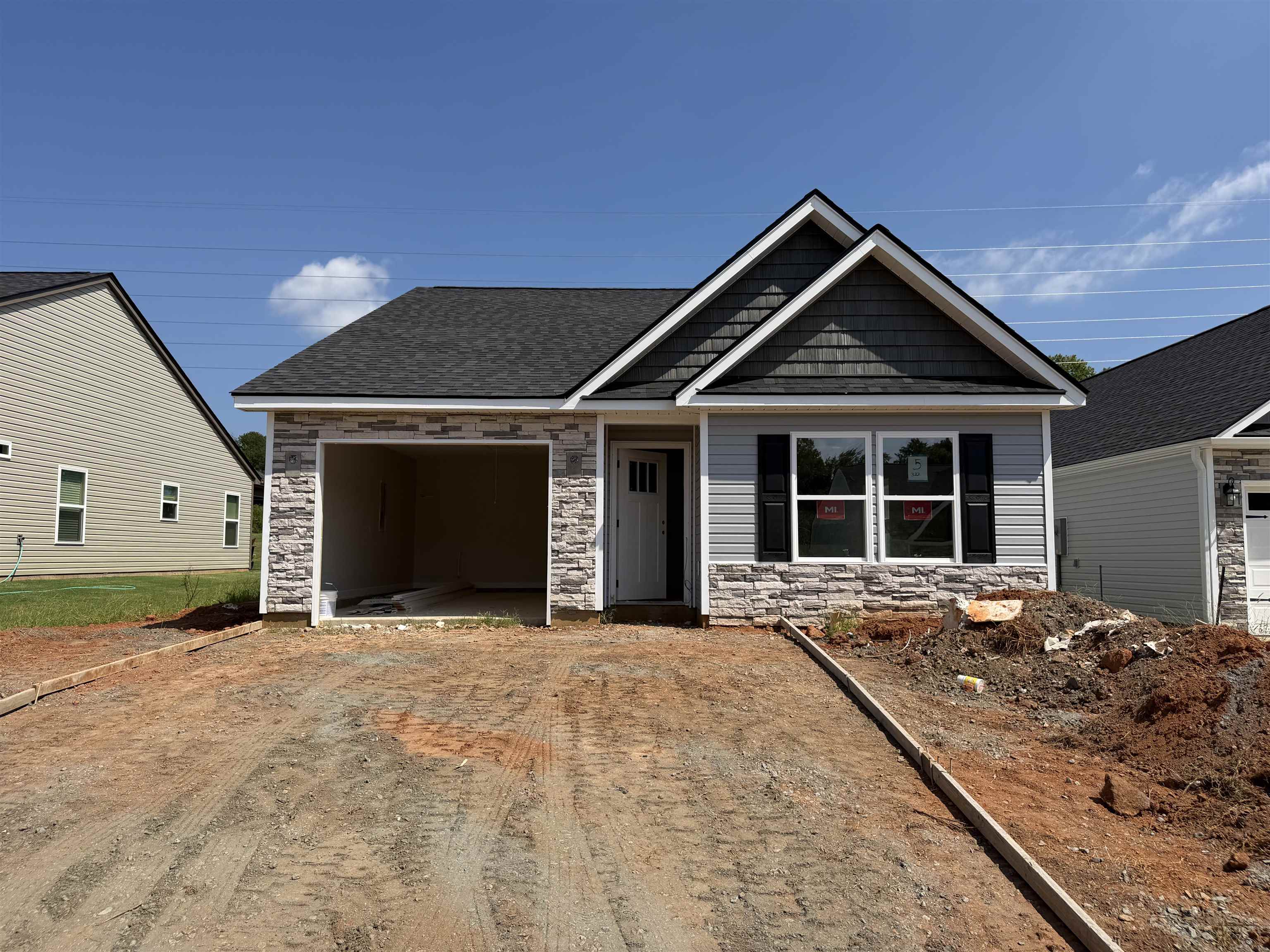 Welcome to the beautifully designed Wrenley Plan, located in the desirable Stone’s Throw community in Inman, SC. This thoughtfully crafted 2-bedroom, 2.5-bath home offers 1,192 square feet of efficient, low-maintenance living with modern finishes throughout. The open-concept main level features a spacious living area that flows seamlessly into the kitchen and dining space. The kitchen is equipped with stylish cabinetry, granite countertops, stainless steel appliances, and a convenient island for additional prep and seating space. A powder room on the main floor adds functionality for guests. Two generously sized bedrooms, each with its own private full bathroom—ideal for roommates, guests, or added privacy. The owner’s suite includes a walk-in closet.Located in the growing Stone’s Throw community, you’ll enjoy easy access to shopping, dining, schools, and major highways while still experiencing the charm of Inman living. Low-maintenance design, modern style, and prime location—Schedule your showing today!