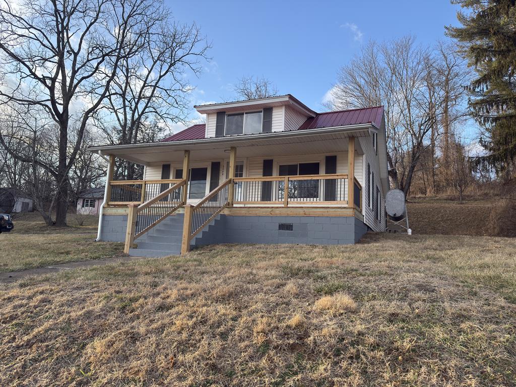 Charming 3-bedroom, 1-bath story-and-a-half home located in the City of Galax, offering both comfort and room to grow. The main level features a welcoming living room, formal dining room, kitchen, and cozy breakfast nook, creating a functional and inviting layout. A roomy, modern bathroom adds updated appeal, while the second floor offers flexible office or study space ideal for remote work or hobbies. Hardwood and LVP flooring run throughout much of the home, adding warmth and durability. The home includes a 3/4 basement for additional storage or utility use. Recent upgrades include all new appliances, a new hot water heater, a new electrical fuse box, and a new metal roof. A paved driveway adds convenience and curb appeal. Situated on a generous 1.3-acre lot with public water and sewer, this property provides ample outdoor space while still enjoying city convenience.