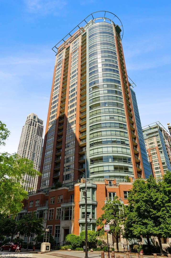 Experience unparalleled luxury living at 415 E North Water Street, nestled in Chicago's vibrant Streeterville neighborhood. This exquisite home offers a spacious 3-bedroom, 3.1-bathroom layout, with nearly 4000 square feet of meticulously designed living space.  The primary suite spans nearly 1000 sq ft and has a large walk in closet, motorized shades and a spa-inspired bath. A separate wing (with its own exit door) has 2 more bedrooms, 2 bathrooms and a family room which could be easily converted to a 4th bedroom. Enjoy panoramic views of the Chicago River and city skyline through expansive floor-to-ceiling windows and from two private balconies. The chef-inspired custom kitchen has top-of-the-line appliances & granite countertops that flow into the open-concept living and dining areas.  Includes two deeded parking spaces on the first floor of the garage, one space is oversized/handicap accessible and the 2nd is EV charging capable. The building offers friendly 24-door staff, onsite manager and maintenance team. The 6th floor has a fitness center, indoor lap pool, locker rooms with saunas and a large south facing community sundeck. Located along the Chicago River, this residence offers a serene retreat while being just steps away from Mariano's, Target, Whole Foods, Northwestern Medical Campus, dining and shopping. The building is very pet friendly and has an adjacent dog run. Over $4M in building reserve account.