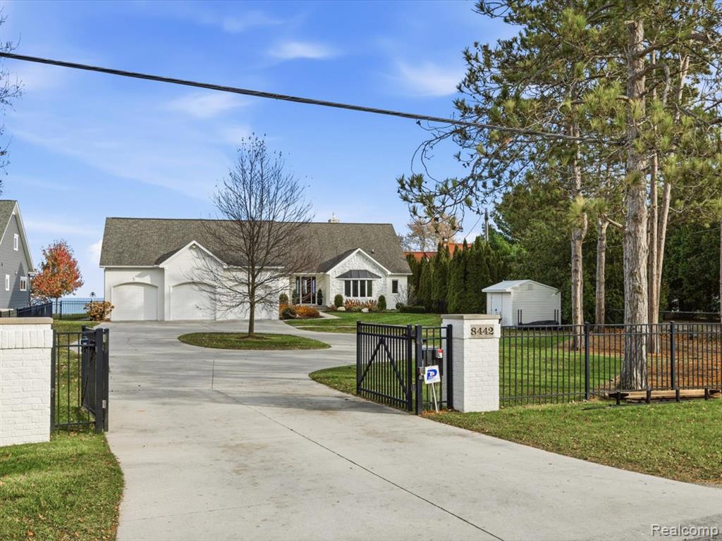 100 Ft of pristine beachfront on Lake Huron with spectacular panoramic views. Completely remodeled home located on quiet Old Lakeshore Rd (not M-25). One story living with 3 Bedrooms and 3 Full Baths on the main floor. Chef's Kitchen with built-in Subzero refrigerator and full wine fridge, 60" Wolf 6 burner gas stove with griddle and double ovens, Wolf steam oven and built-in Miele coffee machine. Entertainers will delight in the lower kevel that offers spaces for entertaining, games and media enjoyment as well as 2 bedrooms and a full bath.  The sauna and cold plunge too!  Additional bedroom, office or hobby room with Sitting Room above the garage (HVAC is provided by mini split). Heated tile floors throughout main floor and basement, LED mirrors in bathrooms, generator, fresh air ventilation system, fully fenced yard with electronic gate, 6 person hot tub, extensive landscaping with 2 tiered brick paver patios and fire pit. 3 car oversized heated garage. The exterior is as beautifully designed and thoughtfully planned out as the interior regarding placement of patios, hot tub and fire pit.  Don't miss this rare opportunity for an exceptional lifestyle!