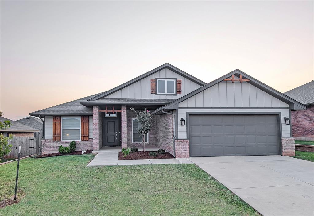 This house in the Bellatona subdivision in Norman has a broad front porch offers a generous welcome with warm cedar accents and inside, the feeling is open and bright.  With fresh paint and new carpet the rooms flow one to the next with a stylish grace, creating a breathtaking sense of space. The floors are durable tile with the warm look of wood. In the corner, a fireplace of chiseled granite offers a rugged, handsome focus for the entire room. The kitchen is the gleaming heart of the home with newer stainless steel appliances and a large granite topped island, invites the gathering but doesn't require it. The can lighting and pendant lights make it a true workspace where the food prepared will be cooked in only the way a gas stove could.  Behind the sliding barn door is the study.  With a split bedroom plan the master suite is, thoughtfully separated from the other rooms and has quartz countertops, double sinks, a tiled shower and separate soaking tub.  The ensuite closet is large.  There is a bathroom shared between the secondary bedrooms, with the same quartz countertops and a tiled tub/shower combo.  Bellatona offers walking trails, beautiful greenspace, tennis courts, and a playground as well as immediate access to HWY 9, and within close proximity to restaurants and grocery stores in the growing commercial area at the intersection of HWY 9 and 77.