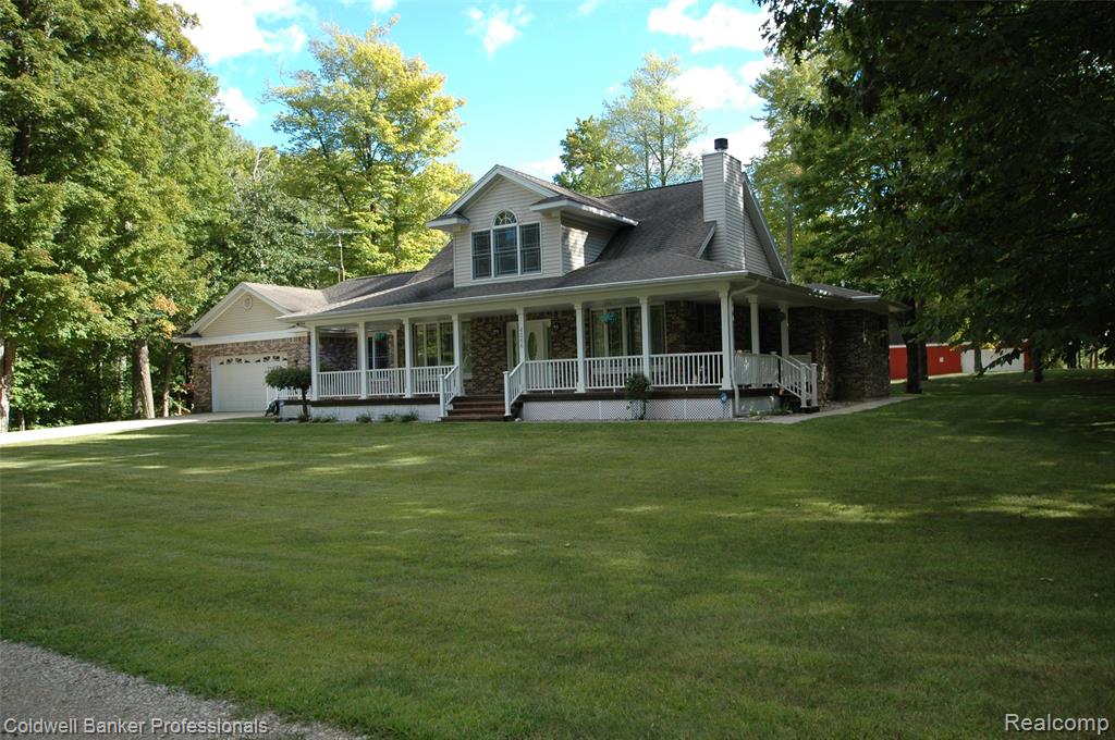 Up North, Back in the Wood, on the River Paradise ,We have Fishing, Hunting and Trails through out the 10 acres. Room for everyone... Circle driveway around the home with Wrap-Around  Trek's Porch, Huge16 x 16 Trek's Deck w/ two bumpers waiting for a party and a Huge Fire Pit  for Conversing and Roasting a Marsh-mellow .  Anderson 400 series windows keeps you well insulated and warm with the 2 Fireplaces one in the Living Room (wood) and One in the Family Room (gas).  Formal Dining room has Beautiful Wood Floor and French Doors. Kitchen has Stainless Steel Appliances and  step down Granite Counter Tops.  All PEX plumbing in the entire house. Take your time and look at what all this home has to offer. Owners recently put in a new Septic Tank, Piled up the wood in the wood shed it ready for you to move in. Look in every nook and cranny if there was if it was empty they made space for it.  Large 48 x 30  2/ story, with heat and electrical Propane Tanks are owned. Barn ready for the up-stair to be finished to your liking, with a side and back lean-to for extra toys. The upstairs in the barn was being built for family member. it  has a place for bathroom etc.. Boat Launch and Dock across the front. convenient Underground Utilities..