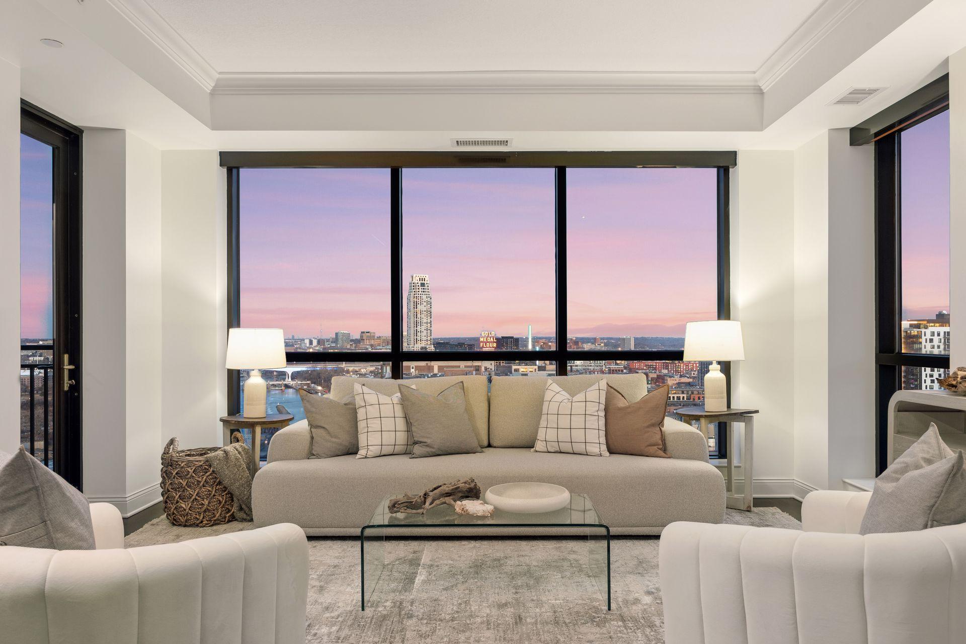 Rare opportunity in the iconic Carlyle – highly sought-after “08” stack. This beautifully updated 1 BD, 1 BA residence offers breathtaking views of Downtown Minneapolis, the Historic Mill District, Mississippi River, St. Anthony Falls, Stone Arch Bridge, and the 3rd Avenue Bridge.Recent updates include refinished hardwood floors, resurfaced kitchen cabinets including new hardware and hinges, fresh paint throughout, new lighting including under-cabinet kitchen lighting, new carpet, double sliding shower doors, and brand-new LG range, microwave, and refrigerator.This home lives large with 1,024 sq ft, floor-to-ceiling windows, and an oversized terrace perfect for enjoying dramatic skyline views. Additional features include an eat-in kitchen with breakfast bar, spacious walk-in closet, large foyer closet, and in-unit laundry.Welcome to The Carlyle and exceptional downtown living.