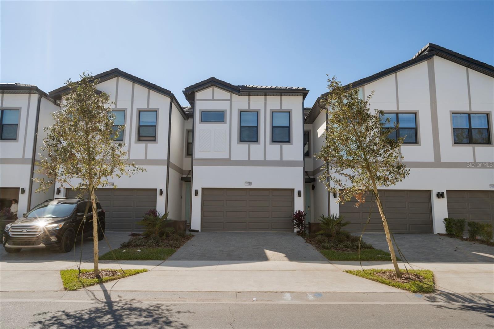 Stunning Fully Furnished 5-Bedroom Townhome with Private Heated Pool Located in the desirable Paradiso Grande community in the heart ofOrlando, this beautifully designed two-story townhouse is fully furnished and offers the perfect mix of luxury, comfort, and investment potential.It features 5 spacious bedrooms and 5 bathrooms, with an open-concept layout that maximizes natural light and creates a seamless flow between living spaces. The elegant kitchen includes solid wood cabinets, stone countertops, and modern appliances, while the living and dining areas provide a warm and inviting setting for entertaining. Professionally decorated throughout, this home is truly turnkey. Enjoy your private heated pool on the ground floor—ideal for relaxing or hosting guests year-round. The garage has been converted into a fully air-conditioned game room,adding extra entertainment value. With no rental restrictions, the property is perfect for short-term rentals, long-term leasing, or personal use.Its unbeatable location near SeaWorld theme park, combined with a gated community featuring 24/7 security guard service, makes it highly desirable for both vacation guests and homeowners alike. A rare opportunity to own a stylish, fully furnished, and versatile property in one of Orlando’s top investment areas.