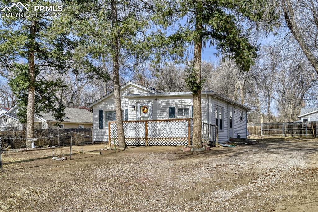 This adorable bungalow, located just northeast of downtown, would be a valuable opportunity for an investor or first time home buyer or anyone wanting to downsize. It sits on a 7700 sq ft lot and is zoned R-5, offering lots of potential to improve the property by adding more living space to the home or adding a garage. Consider the possibility of making extra money by renting out a RV parking space or raising egg laying chickens. . Central air conditioning was added in 2016. Recent updates include a new refrigerator (2024) and new flooring, gorgeous LVP & carpet (2025).  Enjoy relaxing, peaceful evenings around the fire pit and weekend BBQ's. Plenty of yard to accommodate pets. This property is a gardener's delight with lots of space in the back of the home for a vegetable garden and a nice size shed.  Rose & iris perennials in the front yard will make you smile, while lilacs grace the west side. Planter beds are ready for lots of spring flowers.  The tree lined street begs you to imagine the possibilities!  Come look!