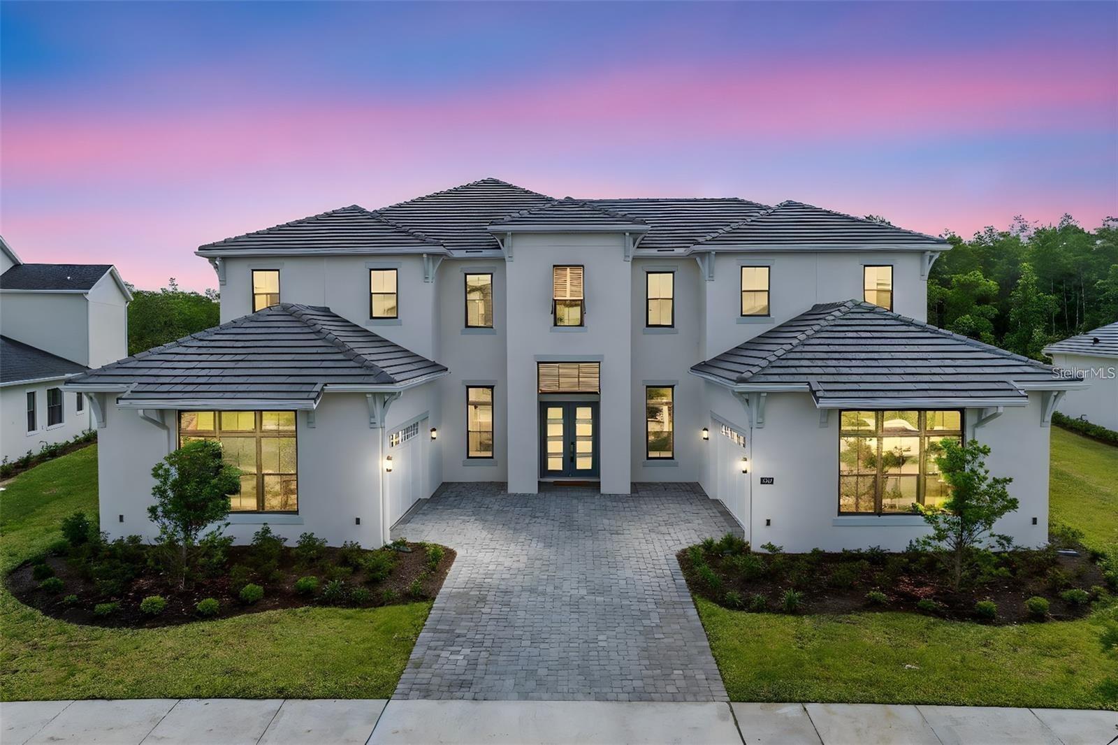 Virtually Staged. Virtually Staged. Welcome to this exceptional home in the Laurel Pointe community of Lake Nona, set on the largest lot in the neighborhood—a stunning .69-acre estate that offers unparalleled privacy. This sprawling property features 7,093 sq. ft. of living space with 6 spacious bedrooms and 6.5 luxurious bathrooms. Upon entering, you'll be greeted by high ceilings and an open-concept floor plan, creating an inviting and spacious atmosphere. The gourmet kitchen is a standout, with marble countertops, top-of-the-line appliances,  and a large central island, ideal for entertaining. The kitchen is also equipped with a vacuum system, providing added convenience for easy clean- up. The master suite is a true retreat, offering a tranquil escape with its expansive layout, dual vanity areas, freestanding bathtub, and a walk-in  glass-enclosed shower. Enjoy the Florida lifestyle with two outdoor patio areas, perfect for relaxing or hosting gatherings under the stars, all set within meticulously landscaped grounds. Additional highlights include two attached garages, each with room for two cars, providing ample storage space. This home is located within Lake Nona, known for its healthcare, technology, and wellness focus, and offers access to miles of scenic trails, lush parks, and top-rated amenities. Minutes from Lake Nona Medical City, the VA Hospital, and major highways, you're also just a short drive from Orlando International Airport, theme parks, and Florida’s beautiful beaches. Experience the luxury and innovation that this exceptional property offers.