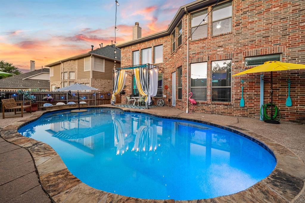 Welcome to this well-maintained 3-bedroom, 3-bathroom home located in the private, gated community of Silverwood. This home features a new roof, new paint, new carpets, new appliances and new smart home lighting throughout. As you step inside, you are greeted by a flex room that provides the ideal workspace or an additional 4th bedroom. The formal dining room features elegant arched entrances and decorative, smart recess lighting and leads seamlessly into the inviting living room with floor to ceiling windows that allow natural light to seep into the space and offers picturesque views of the inviting pool from multiple vantage points. The kitchen is a chef’s dream, with a built-in industrial-size Electrolux Icon Series refrigerator, high end new appliances, a spacious quartz countertop with a gas cooktop and see through glass cabinetry featuring customizable lighting and the wine fridge and pullout drawers provide effortless storage. Upstairs, you’ll discover the spacious primary suite with ample space for a sitting area that leads into the spa like primary ensuite bathroom that boasts a luxurious jetted tub, a separate glass shower, glass doorknobs and dual sinks provide functionality and elegance. Step outside to your own backyard oasis, complete with a Cabana style covered pergola and a secondary built in covered area that overlooks the recently resurfaced, glistening custom pool with an outdoor shower and a swim-up bar and table, with built-in seating and cathedral steps on each side of the pool. This home provides the perfect blend of luxury and relaxation; you don’t want to miss it!