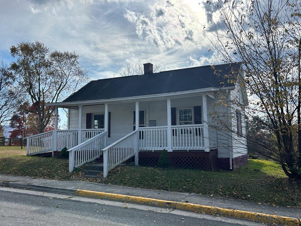 Welcome to this quaint 2 bedroom, 2 bath home located in walking distance to shopping and restaurants. Home sits on a large corner lot with plenty of room for a garden. Inside you will find the original hardwood floors and tall ceilings and outside you have a covered porch and open deck.