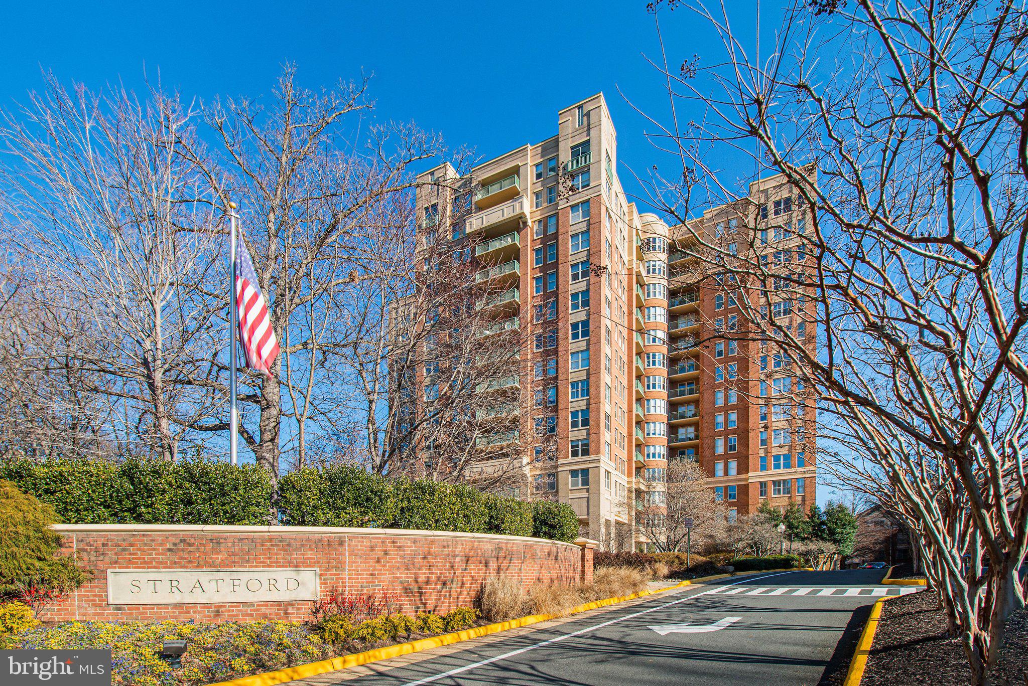 Experience luxury penthouse living in the heart of Reston! This exceptional 3 bedroom, 3 full bath residence on the top floor of Stratford House offers close to 2,100 square feet of beautifully designed living space, with 9 ft. ceilings, abundant natural light, and breathtaking quiet, panoramic eastern views.  On a clear day, you can see 15 to 20 miles across Reston’s bucolic, wooded landscape towards Tysons, DC and Maryland.From the moment you arrive, you’ll be welcomed by the building’s luxurious lobby and concierge service, offering convenience, security, and an elevated lifestyle. A standout feature of this residence is its enclosed balcony/sunroom — an optional upgrade rarely found in the building — creating a versatile, climate-controlled space perfect for relaxing, entertaining, or simply enjoying the scenery year-round.The elegant living room features a gas fireplace creating a warm and inviting focal point while showcasing those spectacular views. The gourmet kitchen is appointed with granite countertops, stainless steel appliances, and abundant custom cabinetry, seamlessly connecting to the open living and dining areas.The impressive primary suite serves as a private retreat, complete with two walk-in closets, a separate shoe closet, and a spa-inspired bathroom featuring double vanities, a jetted soaking tub, and a separate glass-enclosed shower. A second bedroom with its own full bath offers comfortable accommodation for guests or family, while a third bedroom provides flexible space ideal for a home office, study, or additional guest room. Hardwood floors, recessed lighting, and custom window treatments.  There are six ceiling fans throughout.This penthouse includes 2 underground parking spaces and a private 8'x5' storage unit, plus ample guest parking.Ideally situated across from Reston Town Center and just moments from the Silver Line Metro, Dulles International Airport, and major commuter routes, this home offers unparalleled access to premier shopping, dining, entertainment, and travel — plus nearby Reston Hospital, Reston Library, pharmacies, hotels, commercial businesses. parks, lakes, and miles of walking, jogging, and biking trails. Residents also enjoy resort-style amenities including a swimming pool, fitness center, business center, library, and social room.Enjoy maintenance-free luxury living without sacrificing space, comfort, or style — a rare opportunity to own one of Reston’s most desirable penthouse residence you won’t easily find elsewhere in the building.