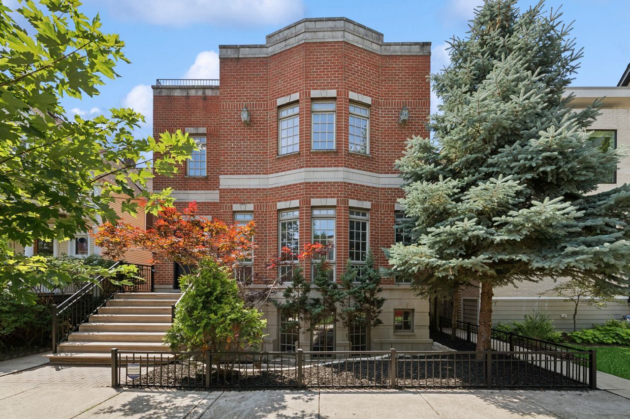 Amazing 6R, 4.5 BA home rests on an extra wide lot ( 37.5x117) in the heart of North Center! Large, gracious rooms with nice natural light. The first floor has a large modern foyer, living room, dining room with butler pantry, eat in kitchen, powder room, and a spacious family room. The fabulous chef's kitchen is white wood with SubZero fridge and Thermador cooktop and oven and unfolds into the expansive family room, an entertainer's dream. The living room and family rooms feature beautiful fireplaces that add warmth and sophistication. The second floor features 4 bedrooms, 3 baths and full sized laundry room. Two baths are en-suite and two share a Jack and Jill bath. Perfect for privacy. The primary suite features a huge walk in custom closet, a spa like stone bath with dual vanities and skylights. 2nd floor staircase leads to an enormous roof deck. The lower level has high ceilings ,a large recreation room with wet bar, the perfect space to unwind while 2 additional bedrooms offer flexibility for an at home office, guest suite or fitness space. Full sized second laundry room and a custom wine cellar also on the lower level. Great outdoor space includes a yard, deck off of the kitchen for grilling, deck off the master to enjoy coffee in the morning, a massive roof deck on the home and another large roof deck on the garage.  The home is freshly painted and has newly refinished hardwood flooring. Large rooms, a large home and a large lot! Amazing space in the city. Walk to the grocery, and all of the restaurants and boutiques in Lincoln Square