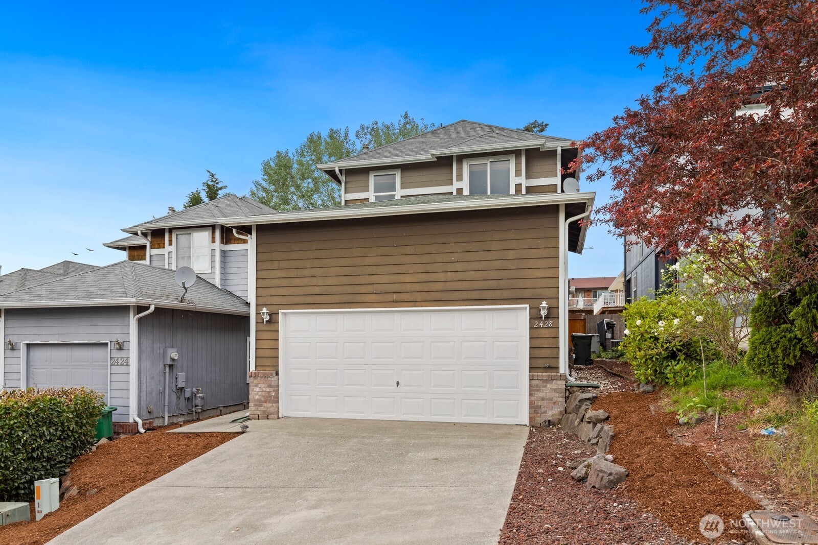 ASSUMABLE 3.25% INTEREST RATE! Ask the listing agent for details and qualification requirements. Desirable Highlands location where comfort, convenience, and value come together. The main level features a spacious living room with a cozy gas fireplace, a generous dining area, and a well-designed kitchen offering great functionality and flow for everyday living and entertaining. The layout is warm and inviting with excellent natural light throughout. Upstairs, an open landing provides a bright transition to the second floor, leading to two well-proportioned bedrooms, a convenient laundry area, and a spacious primary suite complete with a walk-in closet and private bath featuring dual sinks. The home also offers beautiful city and territorial views from the primary suite. The dining area flows seamlessly to a covered backyard patio, ideal for summer BBQs and outdoor entertaining. A gas fireplace adds warmth and character to the living space, creating a comfortable setting year-round. The kitchen and bathrooms have been nicely remodeled, offering modern finishes while maintaining everyday functionality.    Fantastic location just minutes to I-405, shopping, dining, and top-rated schools, making this home a great opportunity in a highly desirable area.