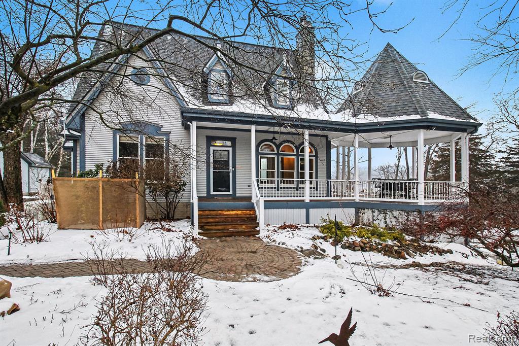 Absolutely beautiful, sunny, light filled, updated, 4+ bedroom 3.5 bath custom built home on and incredible gorgeous, private, nature filled waterfront 20 acres. Open floor plan, lovely wood and tiled floors throughout,  10 ft ceilings, great room with fireplace, formal dining room, gorgeous family room with huge window walls overlooking gorgeous backyard, nature and lake. 1st floor master bedroom with tile bathroom. Entrance foyer, formal dining room, large , updated kitchen with custom built cabinets, professional appliances, prep sink, 6 burner gas cooktop with griddle and 2 ovens. First floor laundry and a half bath. 3 additional large bedrooms and additional 2 full baths and large extra rooms off the two 2nd floor bedrooms. 3rd floor finished Full finished, walkout basement and additional bedroom, office, large family room and full bath. Huge deck and gazebo with lovely wood floors wrapping around the house. 3 car garage with additional 12 x 14 heated workshop,  prof landscaping.  24x52 heated and insulated extra garage with 220 and additional 20-14 storage area.  Natural gas heating. Professional landscaping. Huge 35 x 70 concrete parking area! House roof new @2017, garage roof @ 2022, brand new furnace and AC 2025, new paint throughout, new carpet, and finished basement. Very private, view nature and wildlife from every room. Come see why owners are sad to move! Move-in-condition! State land just down the road.   House is on 2.5 acres.  17.5 acre separate lot included in sale with a tax ID of 0318200019.