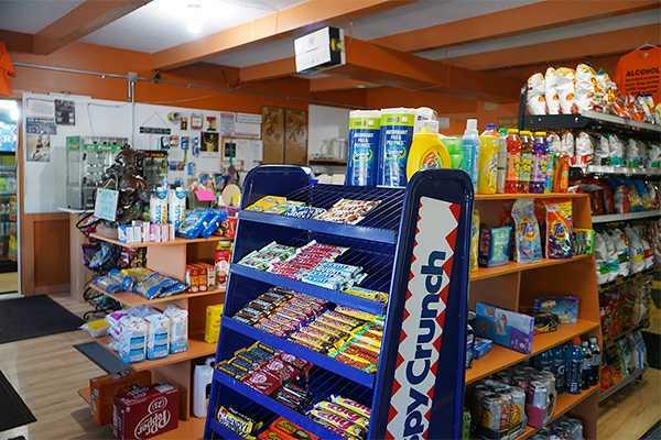 Convenience store with liquor license, business with property for sale in Alberta.
Located just 30 minutes from Lethbridge, offers a diverse range of income streams, including liquor store, convenience store and a 2-bedroom home, all situated on a 0.21 ac land.  
This unique business sells liquor inside the convenience store legally. It gives consumers in Alberta the choice and convenience. This is a very rare business model in Alberta. Easy operation, great for family business. Newly built 267 sf double detached garage. A New roof, water proof walls, a front car port and a spacious storage just right size/location for the store operation. This building is suitable for both business and living.