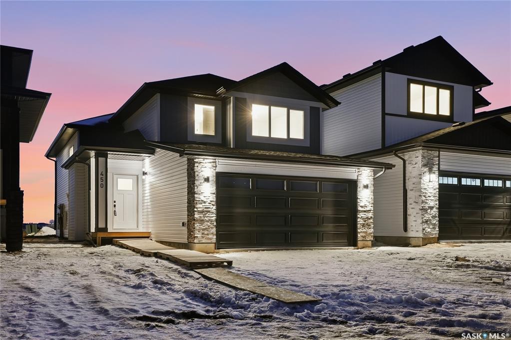 Great location with this Beautiful newly built house that is situated in the popular Brighton area of Saskatoon! Brighton has parks, walking paths, schools & close proximity to many amenities. This stunning newly built home is a 1251 sq. ft modified Bi-level with a double attached 23x20 garage and a finished 2-bedroom legal basement suite.  The house boasts exceptional craftsmanship and attention to detail for anyone looking for a luxurious and comfortable living space.  The main features upgraded 6.5mm vinyl plank flooring, it has a large foyer, open concept kitchen to dining/living area, a 4-piece bathroom, 2 good sized bedrooms and access to the garage as well as the utility room with plenty of storage.  The 2nd floor of the home has a large primary bedroom that features a walk-in closet and a 3-piece ensuite bathroom.  The basement has separate entry into a legal 2-bedroom basement suite.  It features 2 bedrooms,  a 4-piece bathroom, laundry, kitchen, living and dining area.  There is the possibility to qualify for the Sask. Secondary Suite Incentive (SSI) Grant Program where the ministry of finance provides 35% of the total price to construct a new secondary suite at an owner’s primary residence, to a maximum grant of $35,000 per qualifying property.  There will be a concrete driveway & front landscaping that has sod on both sides/1 tree included.  Saskatchewan New Home Warranty is included.  GST/PST is included in the purchase price with the rebate to the builder.  Appliances are included.  Do not wait! Call to view! (Basement suite photos are of a similar built house., suite is almost complete and will be completed.)