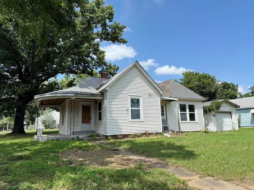 Affordable Fixer-Upper in El Dorado Springs:
Finally an affordable project home is on the market for the savvy investor or DIY entrepreneur.  This 2 bed, 1 bath home, with a large corner lot at the intersection of Pine St and Jackson St, offers 1,056 sq ft in an efficient design.  The property also boasts a 1-car, detached garage and a storm shelter.  There is yard space to easily add-on to the home or build your own shop or firepit area.   With its convenient location and low price point, you can build equity at your own pace.  Call today for a tour of this home!