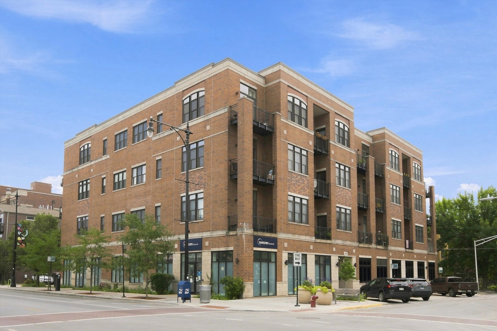 This 3rd floor corner-unit Lincoln Square 2BR/2BA condo with deeded parking sits in a highly walkable neighborhood and in highly desirable Waters elementary and Amundsen high school catchment areas. This is a very light-filled and comfortable space, with an open floor plan, a loft-like feel, flowing from balcony to living/dining to kitchen with granite counters and new (2024) stainless steel appliances. Other upgrades include new windows and sliding glass doors (2022), new Luminette window treatment to patio (2023) and new HVAC (2021). Price includes deeded parking, and unit has separate storage, located on the same floor.  Situated near everything including parks, two amazing public schools, CTA Brown line, shopping, dining and all that Lincoln Square, Ravenswood Manor and Rockwell Gardens has to offer.