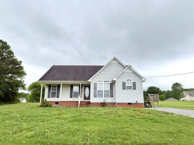 Move-in ready and full of charm! This beautiful 3 bedroom, 2 bath home offers the perfect blend of comfort and country living situated on approximately .76 acres with wide open farm views. Step inside to soaring ceilings, a spacious kitchen perfect for gathering and entertaining, Easy maintenance flooring throughout with absolutely NO carpet! Enjoy peaceful country mornings on the side deck while being only minutes from town, shopping, dining, and conveniences. If you've been searching for a home with space, style, and a little slice of country charm... this is it!