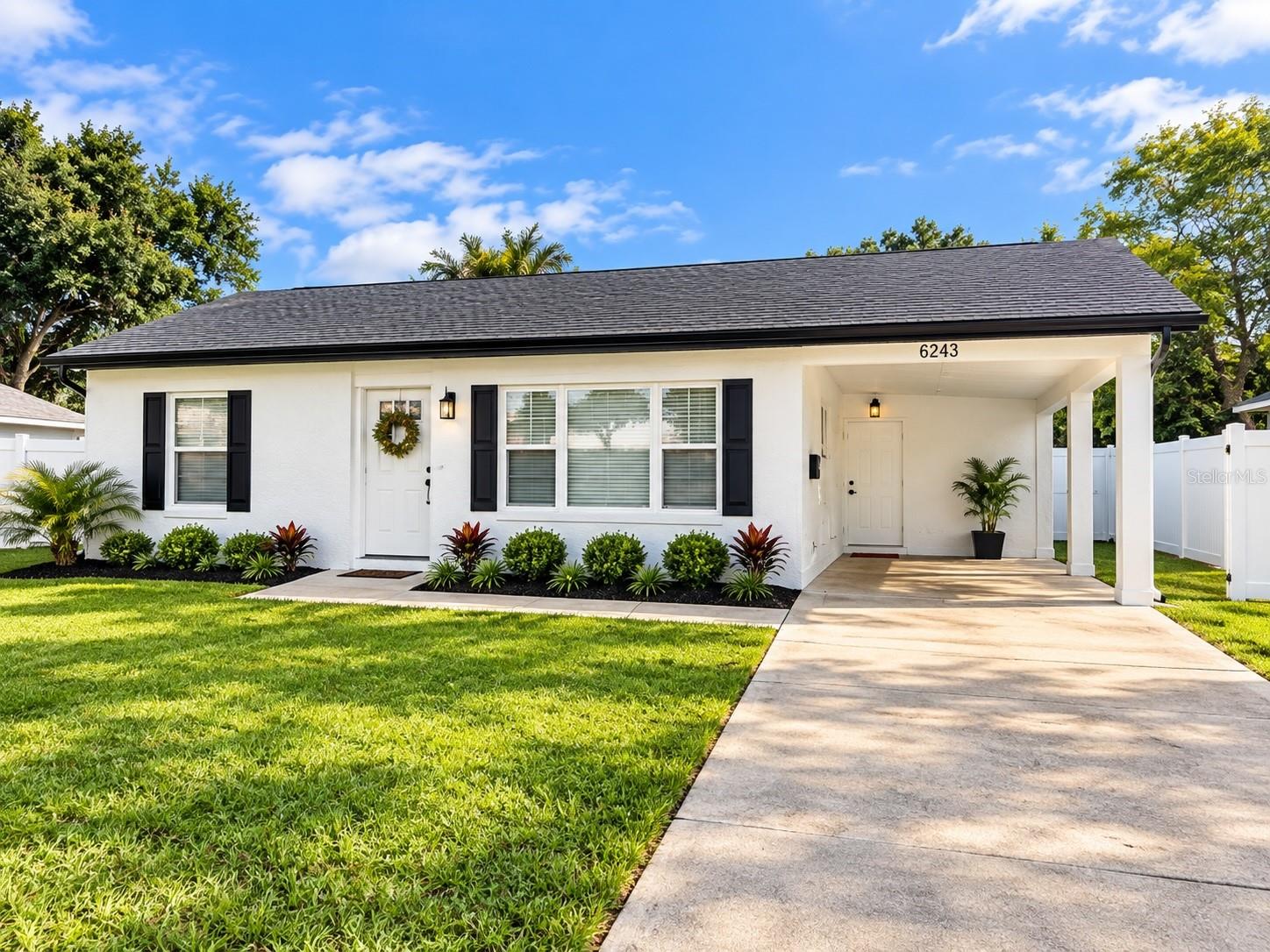 Move-in ready and beautifully updated in the heart of New Port Richey! This charming 2-bedroom, 1-bath home has been refreshed inside and out and offers an impressive list of improvements. Step inside to find beautiful wood-look tile flooring throughout, fresh interior paint, new molding, new blinds, new interior and exterior doors, updated hardware, and a completely remodeled bathroom.  The updated kitchen features new cabinetry, quartz countertops, new appliances, and an open layout connecting the kitchen and living area for comfortable everyday living and entertaining. An additional bonus room provides flexible space for a home office, den, playroom, hobby room, or additional sitting area. Major improvements include a new roof, new water heater, new electrical panel, new gutters, and fresh exterior and interior paint, giving the next owner the benefit of numerous recent updates.  Outside, you’ll find a spacious fenced backyard with plenty of room to create your own outdoor retreat, along with a rear gate providing convenient access to the alleyway. A back patio offers additional space for relaxing, grilling, or entertaining.  Located close proximity to the shops, restaurants, parks, entertainment and activities of Downtown New Port Richey, while still providing a generous private backyard at home with access to the alleyway.Immerse yourself in the rich culture and heritage of downtown New Port Richey with community boat launch, an enchanting riverfront community founded in 1924 that exudes timeless appeal and small-town hospitality With historical structures like Hacienda Hotel, Richey Suncoast Theatre, and museums, local restaurants, boutiques, bars, and breweries just moments away, why wait? Come for a tour while it’s still available