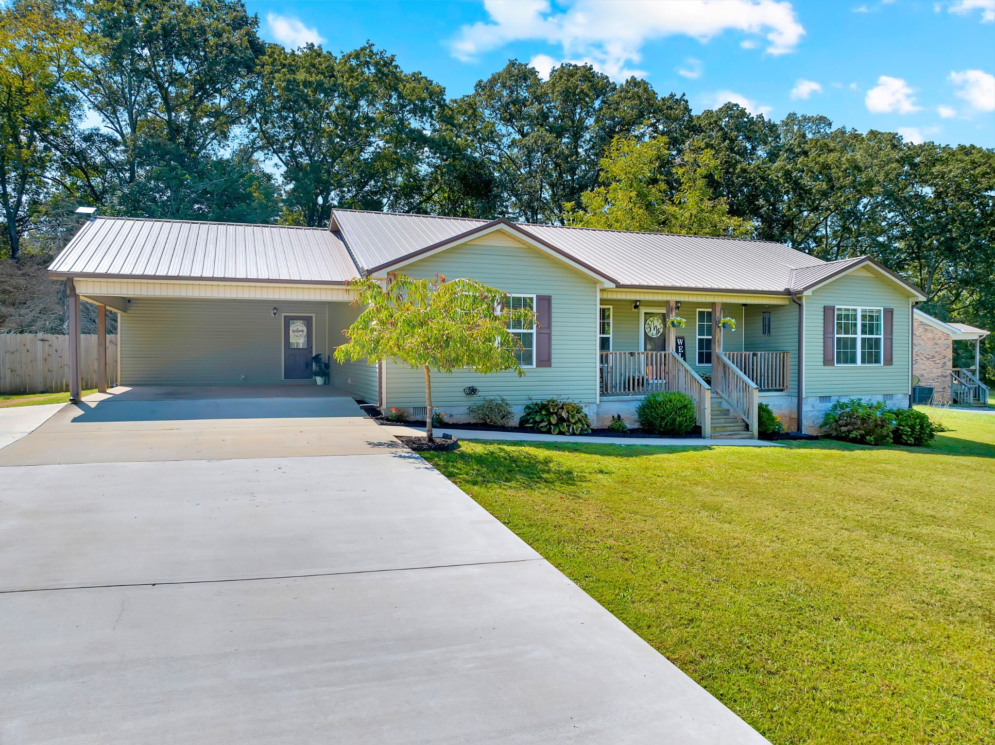 Welcome to this inviting 3-bedroom 2.5 bath home located just mins. from Huntland School. Inside, the open living concept creates the perfect space for family time, entertaining, or relaxing evenings at home. The fenced backyard is ready for fun, featuring an above-ground pool to enjoy on warm summer days. A 2-car carport adds convenience and extra storage. Stainless Steel appliances remain with the home.  This home is move-in ready and designed for easy living in a great location close to town and school.