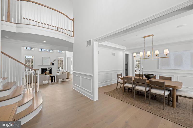 Welcome to Village of Four Seasons Lot 16 - our new Bellflower Model Home construction is underway with luxury finishes being installed!   This fabulous location is ultra convenient and close to great dining, shopping, major routes and everywhere you want to be!  Gorgeous designer selections have been chosen, and the home is slated for completion in May 2026!  In addition to beautiful included features, many sought after options have been added!   Lot 16 is a two-acre homesite that will accommodate the HOA maintained community basin and offers natural views!  The well-designed Bellflower Model is popular with its smart architecture accommodating easy entertaining and everyday living with a long list of included appointments such as cut stone, James Hardie Siding, Pella Windows, rich interior moldings,  wide engineered hardwood floors, a side sweeping main staircase, solid two panel interior doors with Schlage hardware,  Insulated Interior Walls, finished Lower Level with Bedroom or Office and Full Bathroom with Walk Out Entrance to Patio and the list goes on!  Step into the Foyer and be welcomed with beautiful windows and natural daylight!  Once inside, the Dining Room with delight you with its sophisticated tray ceiling, rich wainscot trim and entrance into the Butler's Pantry with glass front wall cabinets - ready to be the serving station for your next get together!  The Gourmet Cook's Dream Kitchen will WOW you with an expansive 10' Island, Tall Painted  Cabinets with Crown Molding to the Ceiling, Under-Cabinet LED Task Lighting, gleaming upgraded Quartz Countertops, and equipped with a Thermador Stainless Steel Appliance Package including Double Wall Ovens, Built In Microwave Oven Drawer, Dishwasher, 5 Burner Gas Cooktop, Cabinet Style Hood, and an integrated Thermador Refrigerator Freezer with Center Beverage Drawer & Ice Maker, all overlooking a Cozy Breakfast Room with Sliding Glass Door with a Natural View!   Your friends and family will enjoy watching the game in the adjoining Family Room with a gorgeous Fireplace and framing Windows.  The First Floor also features a Guest Suite or Home Study with a large Walk In Closet and Dual Access Full Bathroom.  In addition, there is a convenient Mudroom Hall giving access to a covered Outside Entrance, Three Car Garage with a separate Single-Entry Door, Coat Closet and a large Walk-In Closet for a future Elevator.  The Second Floor offers a great design with a dramatic Balcony leading to the luxurious Owner's Suite with a Bay Window overlooking the Rear Grounds, Volume Tray Ceiling, Dual Walk In Closets, and a Spa Bathroom Retreat with a Free-Standing Soaking Tub, Spacious Shower with Frameless Shower Door and Separate Wall Vanities.  Three additional generously sized Bedrooms, Two Full Bathrooms, an abundant Hall Closet and a conveniently located Laundry Room outfitted with Cabinets and Built In Utility Sink complete this Level!  Please note the total approximate square footage includes approx. 1,500 square feet of Lower-Level Finished Space with a great Flex Space, Bedroom or Den, Full Bathroom with Shower, Storage Closets, Daylight Windows and Rear Walk-Out Entrance to a Garden Patio.  Public Water, Public Sewer, and Natural Gas!  Photos are of other model homes and show different options and selections.  We are Open by Appointment only.