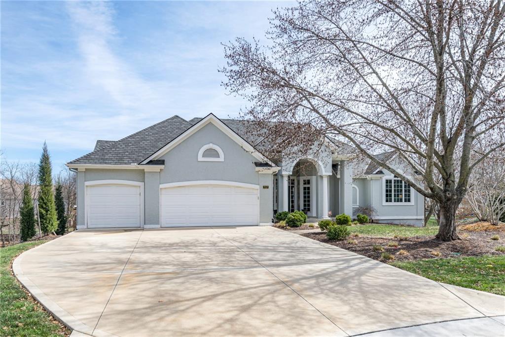 Enjoy lake views from this spacious 4-bedroom, 4 full bath, 1 half bath home with a 3-car garage located in the desirable Lakewood community. The main level features abundant natural light from large living room windows, a formal dining room, and a see-through fireplace connecting the living room and hearth room, creating a warm and inviting gathering space. The primary suite offers a private retreat with double granite vanity, Jacuzzi tub, and a large walk-in closet. The kitchen includes granite countertops and a double pantry providing ample storage. Hardwood floors run throughout the main level, which also includes a large laundry room. Outdoor living is enhanced by three spacious decks with premium Trex decking overlooking the water. The finished lower level is ideal for multi-generational living or entertaining, featuring a kitchenette with granite countertops, a second laundry area, two large bedrooms each with a private bathroom, and a spacious second living area. Additional unfinished basement space provides plenty of storage. Recent updates include two new AC units, two new water heaters, refinished main-level floors, fresh paint in the dining room and kitchen, and a pre-inspected sewer. Residents of Lakewood enjoy exceptional community amenities including two lakes, three swimming pools, recreation facilities, tennis courts, pickleball court, basketball courts, sand volleyball courts, baseball fields, soccer fields, and playgrounds.