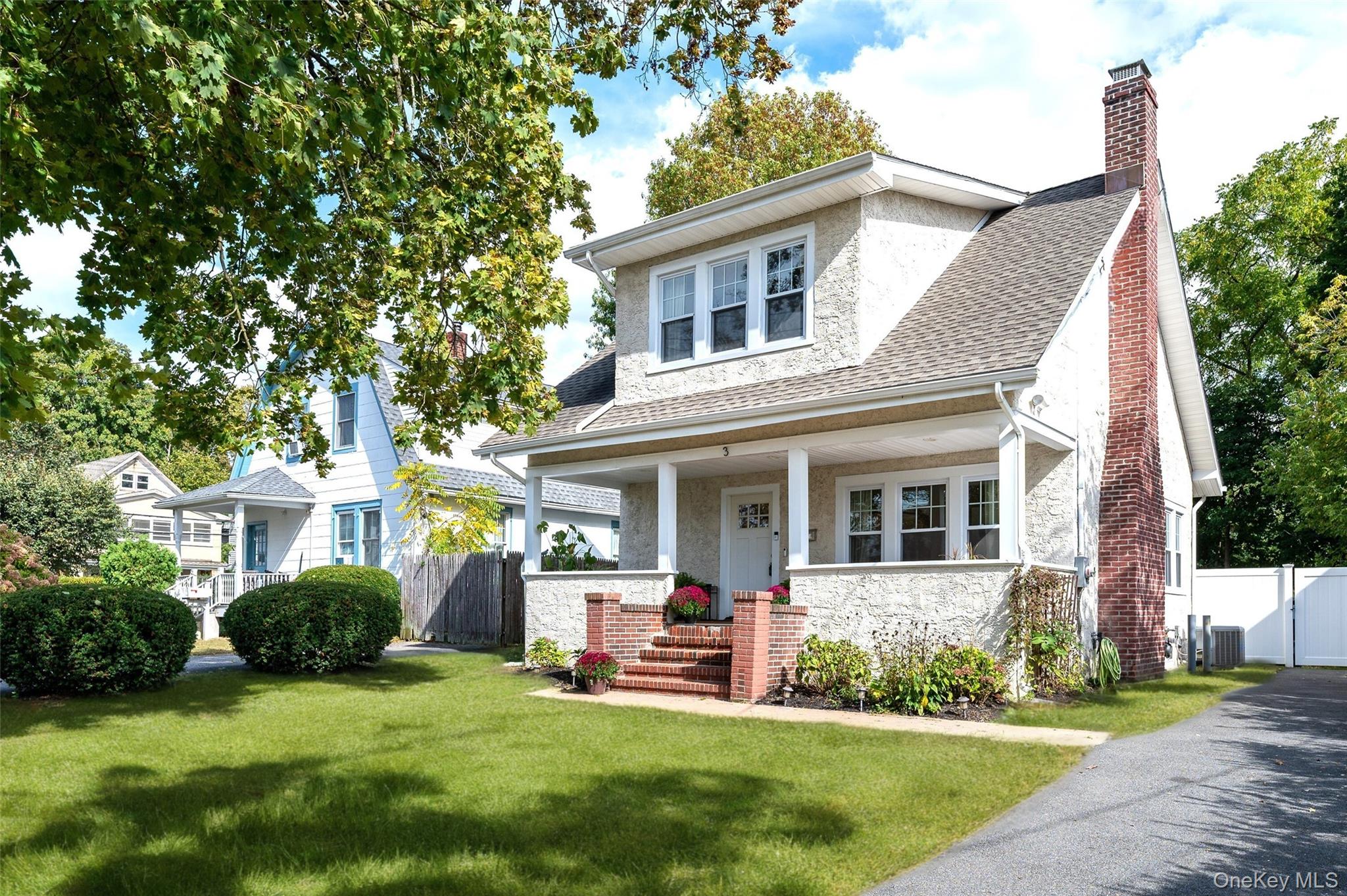 Welcome to this beautifully renovated 3-bedroom, 2-bath home where classic charm meets modern comfort. Step onto the quaint rocking chair front porch and into a sun-drenched first floor featuring high ceilings, new windows, and gleaming new floors throughout. The inviting open-concept layout includes a spacious family room, working fireplace and an updated kitchen with an eat-at counter—perfect for casual meals and entertaining. Upstairs, you’ll find 3 generously sized bedrooms, each offering ample closet space. The house offers 2 full bathrooms with stylish new vanities. Enjoy the privacy of a fully fenced backyard—ideal for relaxing, gardening, or letting pets and children play freely. Perfectly located within walking distance to Mount Kisco’s vibrant shops and restaurants, and just minutes from the Metro-North train station for an easy commute to Grand Central. Move right in and enjoy the best of village living with comfort, convenience, and timeless appeal.