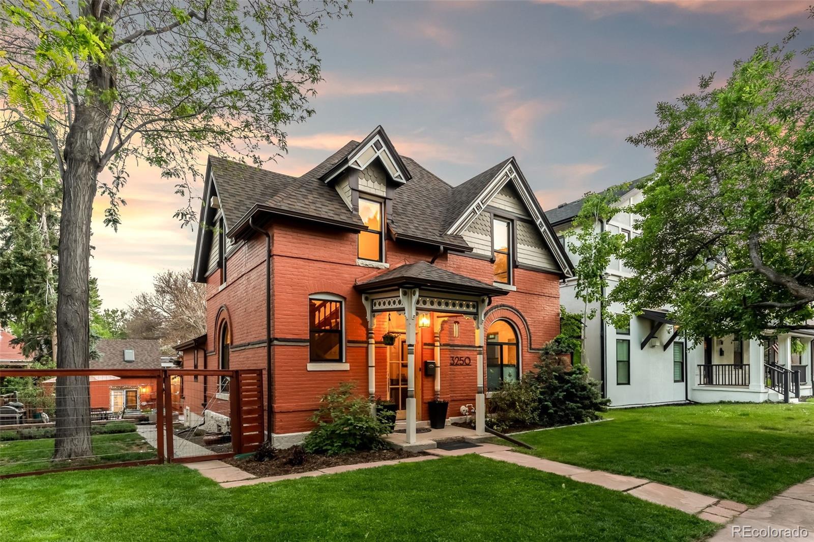 Two homes. One exceptional property. A package that seldom comes to market in the West Highlands. Set on one of the neighborhood’s larger lots, this fully remodeled property combines thoughtfully updated living, incredible outdoor spaces, and a turnkey income-producing carriage house in one extraordinary offering. The main residence blends warmth, character, and modern functionality across beautifully updated living spaces. Wood floors, a fireplace, and an open layout create an inviting atmosphere filled with natural light. A beautifully designed gourmet kitchen anchors the home, seamlessly connecting living and entertaining spaces. The highly desirable main-floor primary suite provides single-level living flexibility. Thoughtful updates throughout create a refined yet comfortable feel that honors the home’s original character. Step outside, and the property truly separates itself. Multiple outdoor living areas create a backyard perfect for both relaxation and entertaining. A dedicated dining area, an outdoor TV lounge, and an oversized hot tub create a private retreat built for year-round Colorado living. It’s the kind of space that effortlessly becomes the center of your summer evenings, football Sundays, and unforgettable gatherings with friends and family. A newly constructed, oversized 22x30 garage offers exceptional space for vehicles, bikes, gear, hobbies, and storage.  At the rear of the property, the carriage house adds flexibility and value. Complete with its own kitchen, bathroom, bedroom, and living area, it currently operates as a successful furnished rental generating approximately $2,100/month with additional upside potential. Use it for income, guests, family, work, or simply having space that evolves alongside the way you live. Just blocks from the excitement of the neighborhood hub at 32nd & Lowell, this is a unique opportunity to own a property that lives beautifully, entertains effortlessly, and works for you in ways few homes ever can.