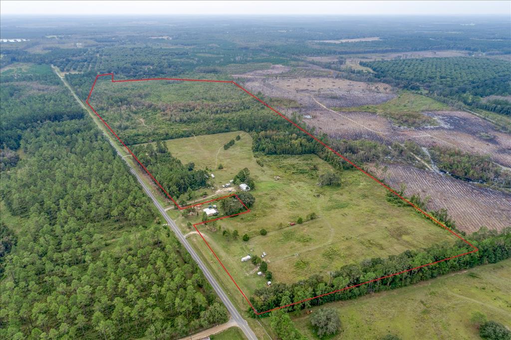 Welcome to 5616 Empress Road, a rare opportunity offering both seclusion and convenience in beautiful South Georgia. With ample paved road frontage and additional dirt road access, this expansive tract is perfectly suited for development, division, or your private outdoor getaway.  The property features two existing wells, making it an excellent option for a homestead, recreational retreat, or future residential development. Whether you're looking to hunt, explore, or invest, this land delivers on all fronts.  Surrounded by large, established hunting tracts, this area is known for its abundant wildlife and peaceful rural setting—ideal for hunting, trail riding, or simply enjoying the outdoors. Yet you're just a short drive from the charm and conveniences of historic downtown Quitman, with its quaint shops, restaurants, and small-town Southern hospitality.  5616 Empress Road combines location, land, and limitless potential. Come walk it and imagine the possibilities.