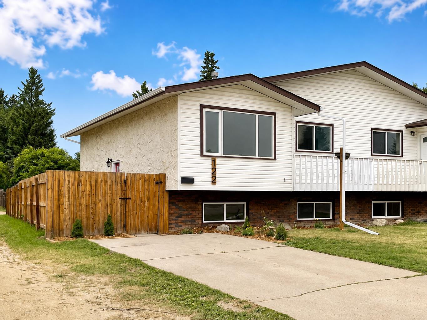RENOVATED | PRIME ANDERS LOCATION | STEPS TO PARK & SCHOOL | 4 BED - 2 FULL BATH ~ Something just feels different about OLD ANDERS. Mature surroundings, tree-lined streets, super friendly neighbours, people out walking, activity at the park, and a genuine sense of community that is difficult to recreate in newer developments. This home puts you right in the middle of it, with a beautiful PARK just steps from the front door and the SCHOOL directly beyond it. It is the kind of location that makes everyday life easier—and the kind of neighbourhood people are excited to come home to. ~ Inside, the home has been RENOVATED THROUGHOUT with a bright, modern finish. The kitchen has been completely transformed with NEW cabinetry, QUARTZ countertops, white subway tile backsplash, NEW appliances, updated lighting and tile flooring. Large south-facing windows bring excellent natural light into the kitchen, dining and living areas, while the front deck provides another spot to enjoy the sunny exposure. ~ The main level offers 2 bedrooms and a beautifully renovated full bathroom. Updates throughout the home include NEW vinyl plank flooring, tile, paint, 4" baseboards, bedroom doors, sliding closet doors, hardware, lighting and fixtures. The staircase has also been carefully finished with matching vinyl plank, nosing and a new railing with coordinating stained finish, creating a cohesive look throughout the home. ~ Downstairs is a bright family room with large windows, 2 additional bedrooms and a second FULL BATHROOM featuring a CUSTOM TILED SHOWER with rain shower head. The lower level also includes laundry with a newer washer and dryer. ~ Outside, improvements include NEW eavestroughs and window casings, refreshed landscaping, cedar-chip garden beds and newly planted perennials. The fenced yard, rear parking pad and back lane add practical space for everyday living. ~ With 4 BEDROOMS, 2 FULL BATHROOMS, extensive renovations and an exceptional OLD ANDERS location just steps from the park and school, this is more than a renovated home—it is an opportunity to move into a neighbourhood that already feels like home.