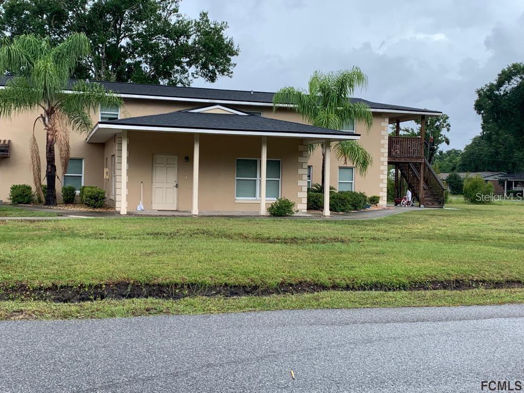 This well-maintained 2 bedroom, 1 bathroom apartment features tile throughout. Home features arch doorways, stainless steel stove and microwave, and a gorgeous fireplace. The unit offers a community-shared front porch with newly painted outside banisters. Close to schools, shopping, I95 and a short drive to the beach! Available now - WATER, LAWN, AND TRASH INCLUDED! No pets allowed.