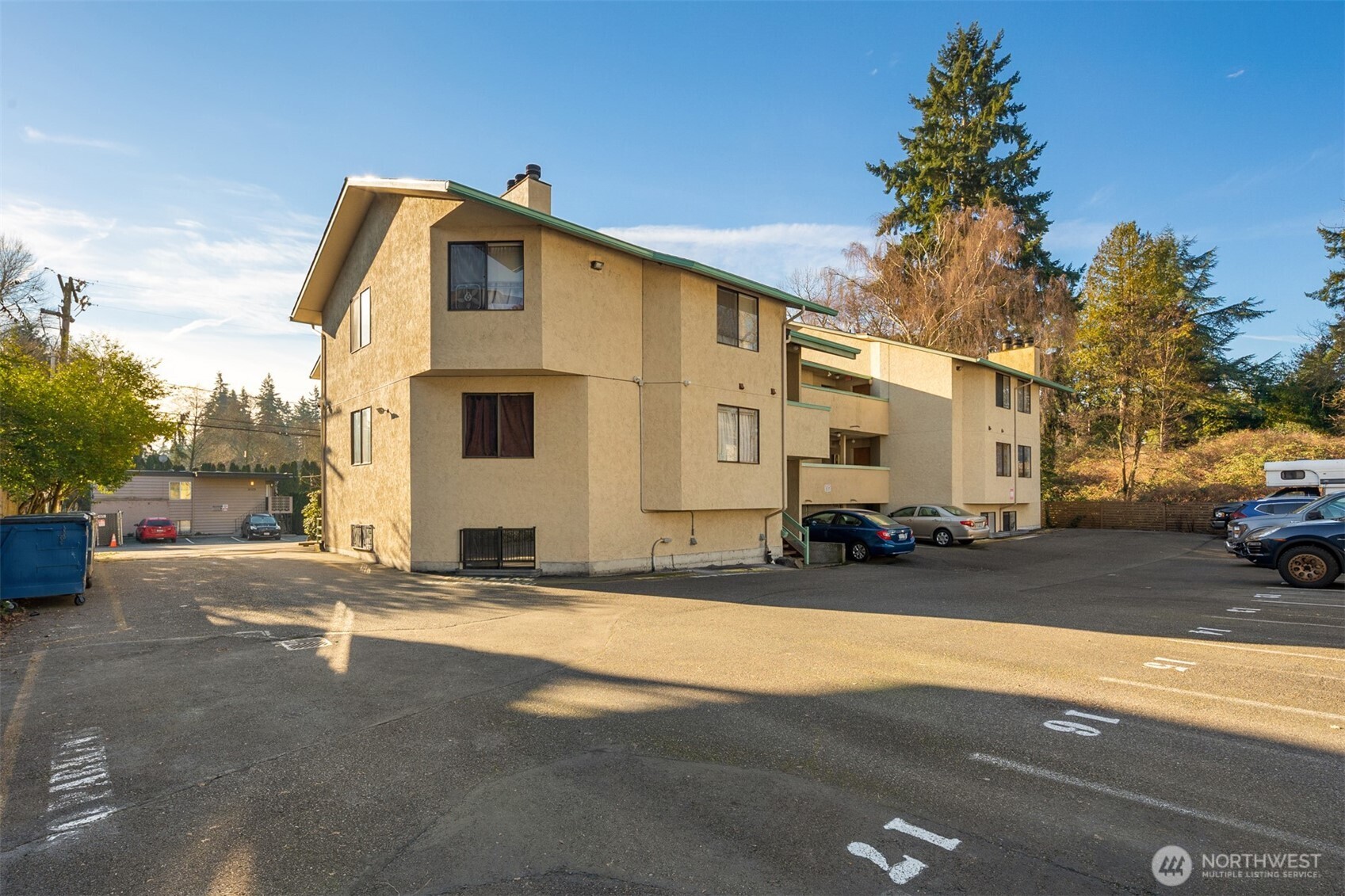 Enjoy the convenience and comfort of ground-floor living in this secure North Seattle community. This spacious 1-bedroom condo offers a thoughtfully designed open layout with generous living space, perfect for everyday living or entertaining. The oversized kitchen provides ample counter and cabinet space, making cooking and hosting effortless, while the large bathroom features tasteful finishes and a comfortable, functional design. The unit feels open and welcoming, with easy access to outdoor space—ideal for relaxing or enjoying fresh air without stairs. A perfect starter home or investment opportunity, this condo combines space, functionality, and value. Enjoy low HOA dues, on-site laundry, reserved parking, and no rental cap. Fantastic location with quick access to buses, I-5, light rail, restaurants, parks, and local markets. A rare opportunity to own a well-sized unit in a prime North Seattle location.