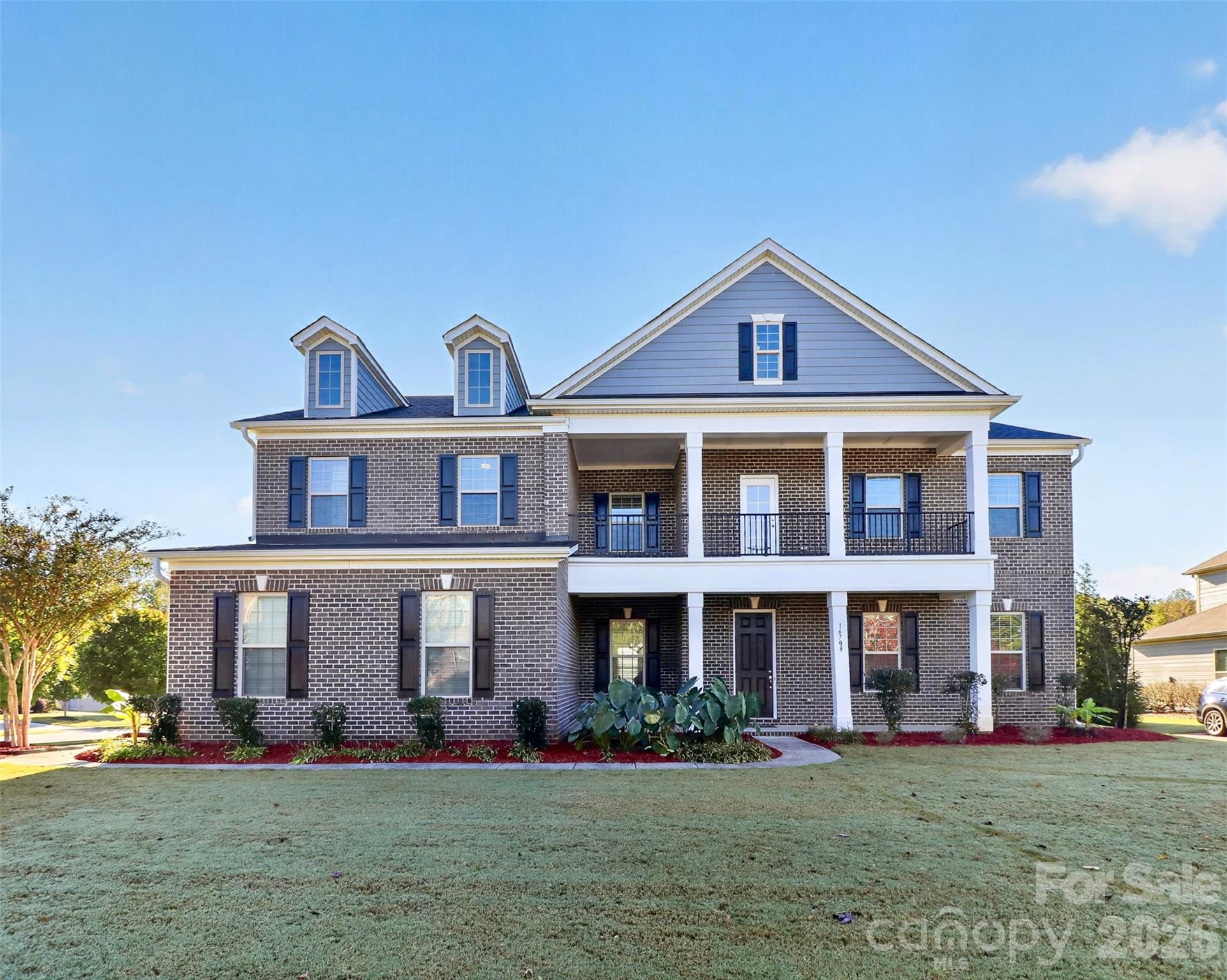 Welcome to this impressive home in the highly desirable Mirabella community in Huntersville! Built in 2017, this beautifully appointed home offers 6 bedrooms and 5.5 baths, all set on a generous 0.44 acre corner lot. With its attractive brick front and James Hardie siding exterior, inviting covered front porch, upper level balcony and a 3-car side load garage, this home combines timeless curb appeal with exceptional space and functionality. Inside, you'll discover an open, flowing floor plan showcasing spacious living areas, a guest suite on main level, a chef-inspired kitchen that features abundant cabinetry, walk-in pantry, stainless steel appliances, a large center island and plenty of space for entertainment. The primary suite upstairs offers a relaxing private retreat complemented by a spacious walk-in closet, garden tub and dual vanities. With 6 bedrooms and 5.5 bathrooms, there is room for everyone to enjoy their own space. A huge upstairs loft adds even more versatility to this already spacious home. Additional upgrades include tankless water heater, EV charging pre-wire and mudroom/drop zone. Ideally located near shopping, dining, I-77, Lake Norman and Uptown Charlotte. Don't miss the opportunity to make this Mirabella home yours!