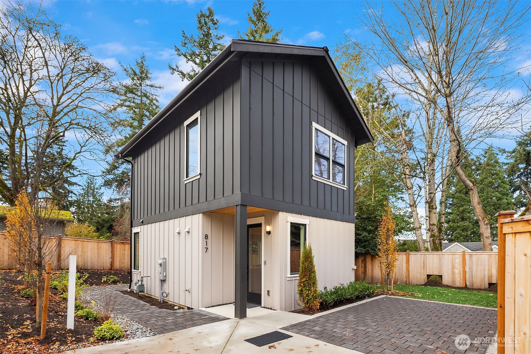 Welcome to this new construction cottage in coveted West of Market. Light-filled main level features open kitchen, dining, and living with fireplace and sliders to a covered patio and fenced yard—perfect for indoor/outdoor living. Kitchen shines with gas range and quartz counters. Upstairs offers a serene primary suite with luxurious bath & WIC. Secondary bedroom includes walk in closet. Full bath and laundry complete this thoughtfully-appointed home. Enjoy proximity to Lake Washington, Waverly Beach Park, and downtown Kirkland. Off-street parking provides peace of mind at the end of the day.