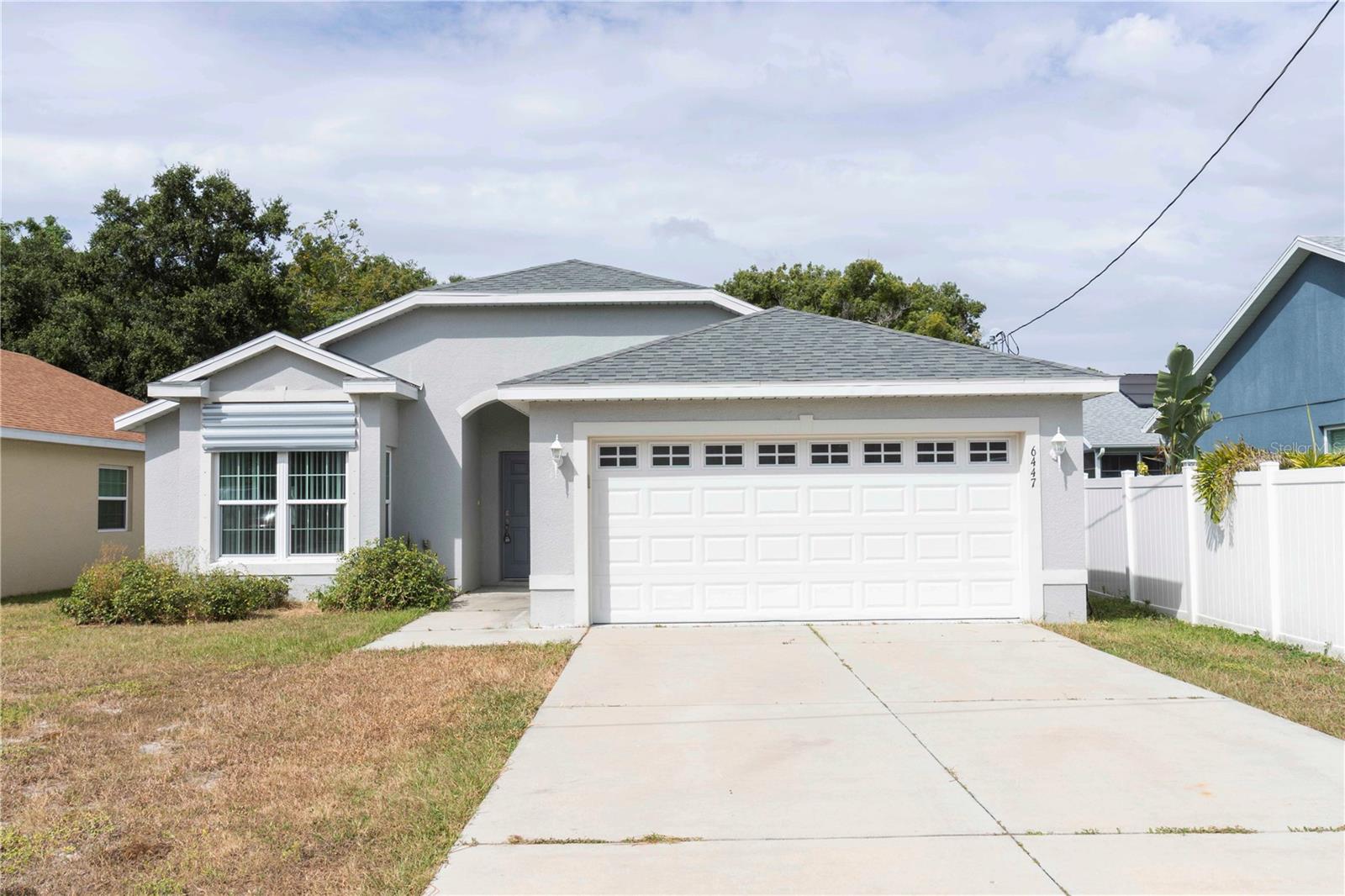 Discover the perfect blend of comfort and vitality in this spacious 3-bedroom, 2-bath home with a 2-car garage, ideally situated downtown, just four blocks north of Main Street’s vibrant shops, delightful restaurants, North Bay Hospital, and picturesque Orange Lake. As you enter, you’ll be embraced by an open floor plan that invites warmth and connection, with natural light streaming in through every window.

The kitchen is a welcoming space, featuring an eat-in area, a pantry, a breakfast nook, and ample cabinet space, all seamlessly flowing into the living area. For a touch of privacy, the desirable split-plan separates the two bedrooms from the expansive master suite. The owner's retreat is a true sanctuary, boasting a generous walk-in closet and a luxurious bathroom with dual sinks and a cozy tub/shower combo.

Step outside to discover an expansive outdoor area, filled with endless possibilities. Whether you dream of hosting summer barbecues, cultivating your own oasis, or having space for a boat, RV, or trailer, this yard complements the carefree lifestyle you seek.

Enjoy peace of mind knowing that this home is beyond flood zones, with no CDD or HOA fees and no restrictions on property use.

What journey awaits you? Immerse yourself in the vibrant life of downtown New Port Richey, where live theater, trendy restaurants with diverse cuisines, unique gift shops, and a thrilling nightlife await you. Embrace the outdoors with biking and canoeing along the serene Cotee River and enjoy local parks that foster connection through music festivals and community events. Golf enthusiasts will find idyllic courses nearby, and beach lovers can unwind on beautiful shores, all just a short drive away.

Seize this opportunity to experience a delightful blend of comfort, convenience, and excitement in your new home! This gem will not last long.