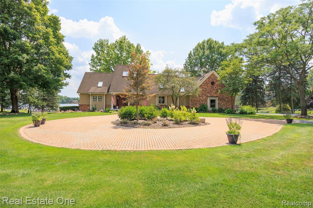 Stunning Lakefront Home on All-Sports Waumegah Lake – Clarkston
Exceptional lakefront living with 225 feet of frontage on all-sports Waumegah Lake. This beautifully maintained home offers 3 bedrooms, 2 full baths, 2 half baths, and more than 4,480 SF of finished living space. First-floor primary suite with en-suite bath. Spacious open-concept main level with large windows showcasing panoramic lake views from nearly every room.
Features include a finished walkout basement, large bonus room, loft, 2.5-car attached garage with epoxy floors, plus an additional boat garage with direct lake access. New furnace (2022), new water heater (2022), Generac whole-house generator, water softener system, and water filtration system. Sprinkler system using lake water with new pump included. Enjoy southern exposure, a private dock, and a beautifully landscaped yard.
Live like you're on vacation all year long—boating, swimming, relaxing by the water, and taking in unforgettable sunsets, right from your own backyard.
Occupancy is negotiable.