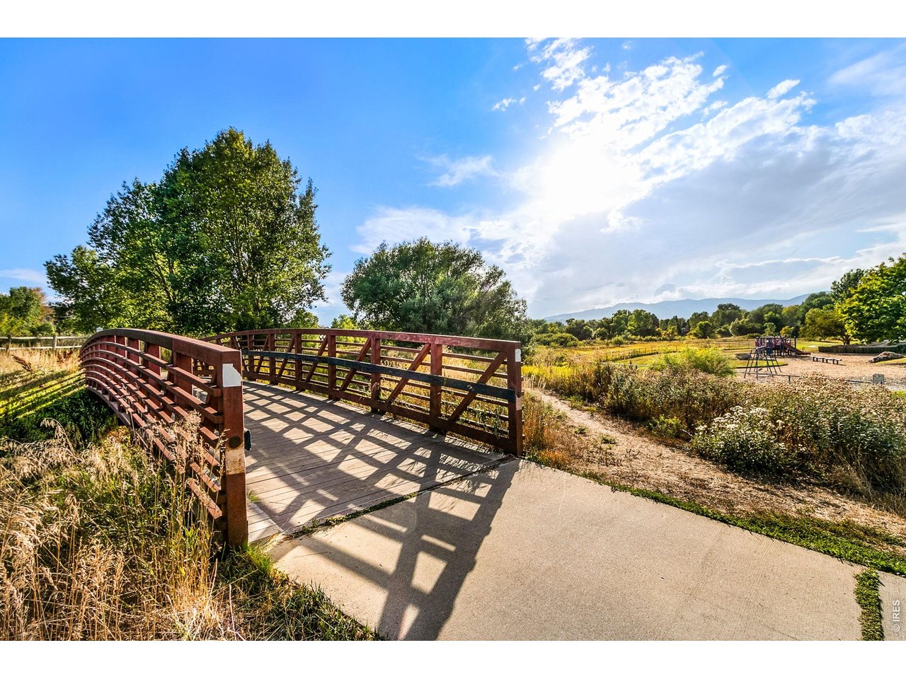 Beautiful 4-bedroom, 4-bath two-story home on a large corner lot in the highly desirable Village West neighborhood of West Fort Collins. With fresh interior paint, new carpet, and updated light fixtures throughout, this home is move-in ready and filled with warmth and character. The main level offers spacious living areas, including multiple gathering spaces and two of three cozy wood-burning fireplaces-perfect for relaxing or entertaining. The functional layout provides flexibility for everyday living, with beautiful hardwood floors and plenty of natural light throughout. Upstairs, the oversized primary suite serves as a private retreat, featuring hardwood floors, a charming wood-burning fireplace, and ample space to unwind. Two additional bedrooms offer comfort and versatility for family, guests, or a home office. The finished basement expands your living space with a large rec room, an additional bedroom with a walk-in closet, 3/4 bath and plenty of room for hobbies, guests, or entertainment. Enjoy the benefits of living in Village West, including access to a neighborhood pool and close proximity to CSU, Horsetooth Reservoir, Old Town Fort Collins, and a variety of shopping and dining options. Outdoor enthusiasts will love the easy access to Spring Creek Trail and Rolland Moore Park. This home offers the perfect combination of location, space, and thoughtful updates in one of Fort Collins' most sought-after neighborhoods.