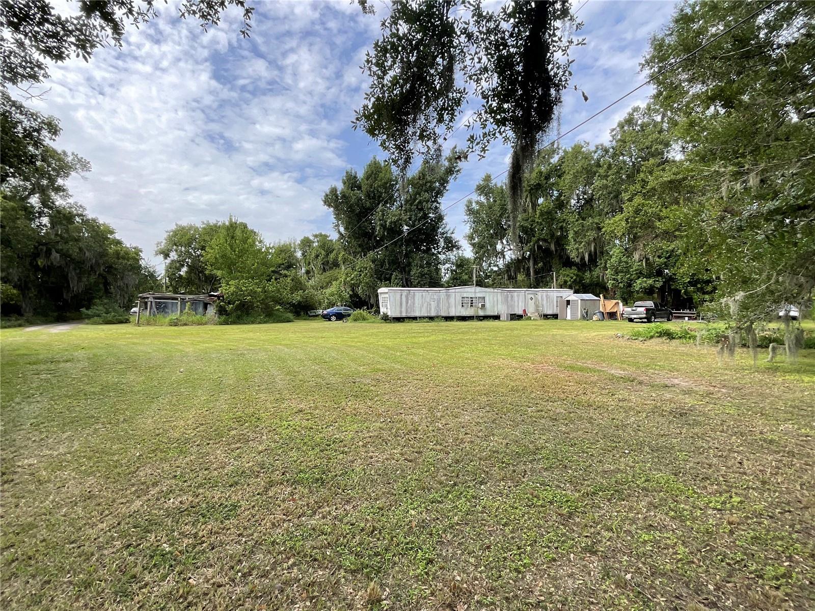 **Exceptional Land Opportunity in Plant City!**Unlock the potential of this beautiful property at **3406 Holloway Rd, Plant City, FL**, where the true value lies in the land. Whether you're looking to build your dream home, invest, or explore future possibilities, this property offers a rare opportunity in a desirable rural setting.The existing mobile home is being sold **as-is** and is considered to have little to no contributory value. The property is ideal for buyers seeking usable land with plenty of space for a new custom home, agricultural use, or other permitted uses, subject to county zoning and regulations.Conveniently located with easy access to major highways, shopping, dining, and everything Plant City has to show, this property combines the peace of country living with everyday convenience.**Highlights:*** Value is in the land.* Existing mobile home conveys **as-is** with no assigned value.* Spacious property with endless potential.* Excellent opportunity to build, invest, or create your own private retreat.* Convenient Plant City location with easy access to Tampa, Lakeland, and surrounding areas.Bring your vision and take advantage of this unique opportunity to own a versatile piece of land in one of Plant City's growing areas!
