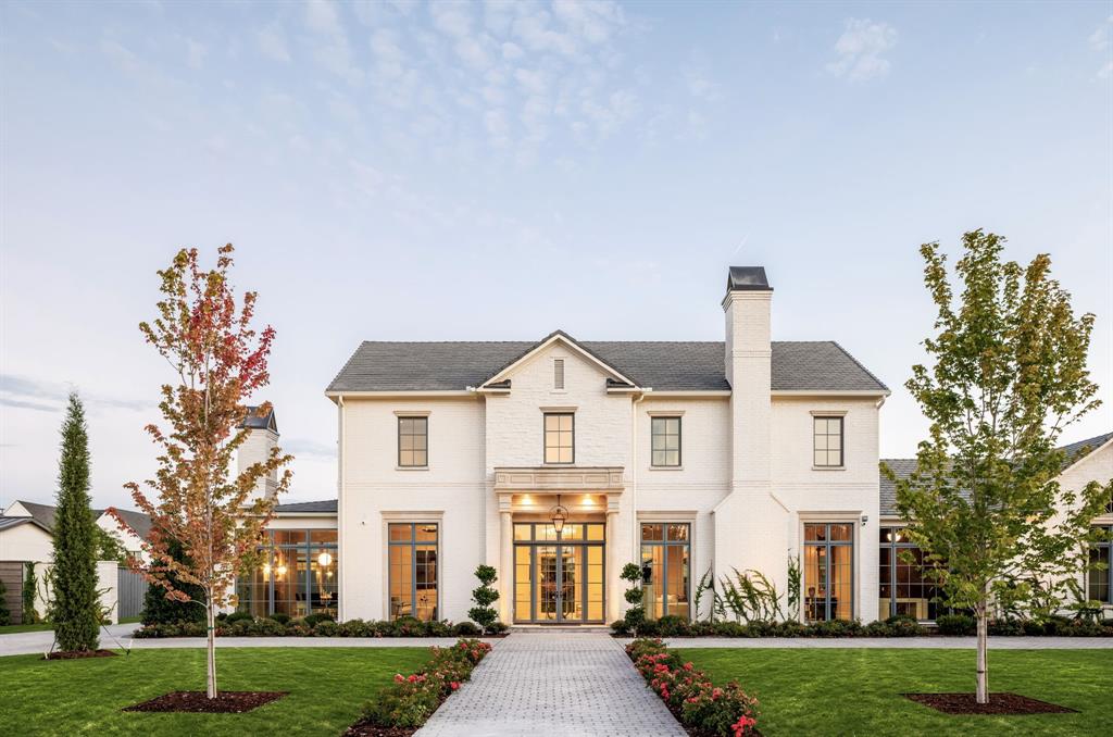 Nestled in Preston Hollow, 5610 Lobello Drive is a newly constructed Georgian-inspired estate built by Pierce Jordan Development that epitomizes timeless Southern elegance. Spanning 7,890 square feet on a meticulously landscaped half-acre lot, this home offers a harmonious blend of classic design and modern amenities, making it an ideal sanctuary for family living.The residence features five generously sized bedrooms, six full bathrooms, and two powder rooms, ensuring comfort and privacy for every family member. Classically scaled rooms are designed for both formal and informal entertaining, with interiors showcasing marble, limestone, and wide-plank wood flooring. Custom cabinetry and hand-troweled plaster finishes add to the home's sophisticated ambiance. A chef’s kitchen equipped with Thermador appliances and luxurious marble countertops serves as the heart of the home. The gracious primary suite includes a private coffee bar, a luxurious marble-clad floating tub, and a dressing room with an additional laundry closet, providing a serene retreat within the home. Designed to accommodate modern lifestyles, the home features a study, game room, office, den, and a lounge with a bar, offering versatile spaces for work and leisure. The property includes a 40-foot-long pool and spa, an outdoor kitchen, and a gracious indoor loggia leading to a covered outdoor terrace, perfect for alfresco dining and relaxation. This property's timeless design and thoughtful amenities offer a harmonious blend of elegance and practicality, making it the perfect home for families seeking both beauty and functionality.