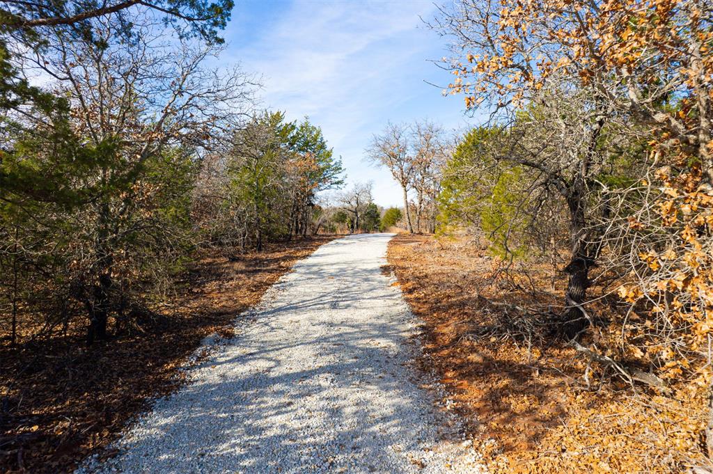 This beautifully wooded 10-acre tract in East Norman that is ready for your custom home. The hard work has already been done, this property features a newly constructed gravel drive, cleared area for build site, and gentle rolling terrain ideal for a custom home.Surrounded by mature trees, the land provides natural privacy, open views, and multiple spots perfectly suited for placing a home, shop, or barn. Power is available at the road, and the property is just minutes from Lake Thunderbird, offering a peaceful retreat that remains convenient to Norman’s shopping, restaurants, and amenities.Whether you’re planning a permanent residence, a weekend getaway, or a long-term land investment, 3406 Tucker Trail offers a rare, build-ready opportunity in a highly desirable part of East Norman.