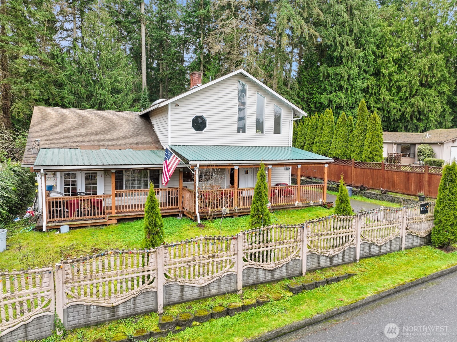 Nestled in a prime Kirkland location, this expansive 6-bedroom, 4-bathroom home offers a rare opportunity. Spanning 2,800 square feet on a generous 7,000+ square-foot lot, the home is currently leased as an adult family home through August 2026. With ample space and potential, it’s ideal for those seeking a well-located, large home. The lease can be transferred to the new owner. Please note, the business does not convey. This spacious home offers a versatile layout that perfectly balances communal living with the ultimate private retreat. The main floor is designed for both comfort and functionality, featuring a  kitchen that flows into both a  living room and a cozy family room. This level also includes five well-appointed bedrooms, two full bathrooms, and two  half bath. The upper level, featuring a beautiful, self-contained suite that offers total independence and can be perfect for staff or provider. This second-floor sanctuary includes its own  kitchenet and living area, a large bedroom, a full bathroom, and a generous walk-in closet. Whether you are looking for a multi-generational living solution or an AFH, this home provides the space and flexibility to suit any lifestyle.