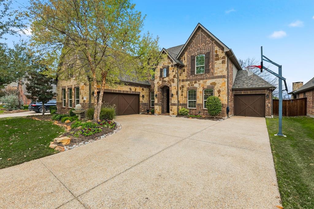 Discover this beautifully maintained 4-bedroom, 3.5-bath home in The Highlands at Trophy Club, offering just over 3,500 sq ft in one of Texas’s safest cities and within top-rated Northwest ISD. Meticulously cared for by one owner, this home features stunning wood floors, fresh paint,  and a spacious open-concept design ideal for both relaxed daily living and effortless entertaining. The grand primary suite is downstairs for ultimate privacy, while upstairs includes three large bedrooms—two share a Jack and Jill bath, and one enjoys its own private en-suite. A large media room and an additional versatile living area create the perfect space for game nights, movie marathons, or a home office setup. Storage galore throughout, with walk-in closets, custom built-ins, and clever under-stair storage.Set at the back of the neighborhood with no rear neighbors, this property boasts an unbelievable lot with peaceful views of mature trees, open green space, and a picturesque pond with a gentle water feature—all enjoyed from your covered patio. Take in frequent visits from local wildlife or sip your coffee while immersed in natural beauty and quiet. Only 20 minutes from DFW Airport, and moments from Trophy Club’s parks, scenic trails, dining, and shopping, this home combines comfort, convenience, and privacy. Experience quality living, elegant finishes, flexible spaces, abundant storage, and the best of Trophy Club’s outstanding community lifestyle. Schedule a tour today and make this Highlands gem yours.