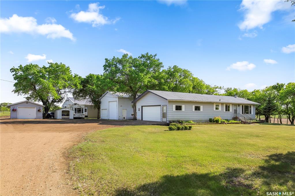Take the short and scenic drive down Valley Road and continue west across Hwy60 for 3.5km to find this conveniently located 40 acre property with pavement to you driveway.  As you approach you will notice the tree lined driveway beyond the solar powered gate.  Pulling into the yard you will find the 1100 ft bungalow with a large 2 car attached garage, a single detached garage and an additional 26 x 28 work shop with 14' ceilings. The home has 3 beds and 1 bath on the main, a large living room with huge windows over looking the well maintained yard and main floor laundry room with a sink.  The basement is open for development and is roughed in for a bathroom, has new furnace, water heater and air conditioner.  The crown jewel of this property is the absolutely amazing 60 x 60 barn and attached 60 x60 hay shed.  This barn is one of the nicest private set ups for horsed that you will find.  The barn is fully insulated and heated, has rubber matting on concrete in the common areas, hot and cold water and a floor drain, 5 stalls with 2 x 6 floor topped with 1 1/2" rubber matting, 2 large breeding/foaling stalls, a washroom, laundry, large meeting room and a spectacular tackroom.  Directly out of the barn you will find an incredible 180 x 350 outdoor riding arena with a clay base with a clay and sand mixture for exceptional footing.  9 individual runs fenced in steel most with shelters and year round water surround the arena.  There are also 3 separate pastures on the property.  This is a great opportunity for a boarding, breeding or training facility.  The virtual tour shows the entire property with many info pop ups for more details about this unique property.