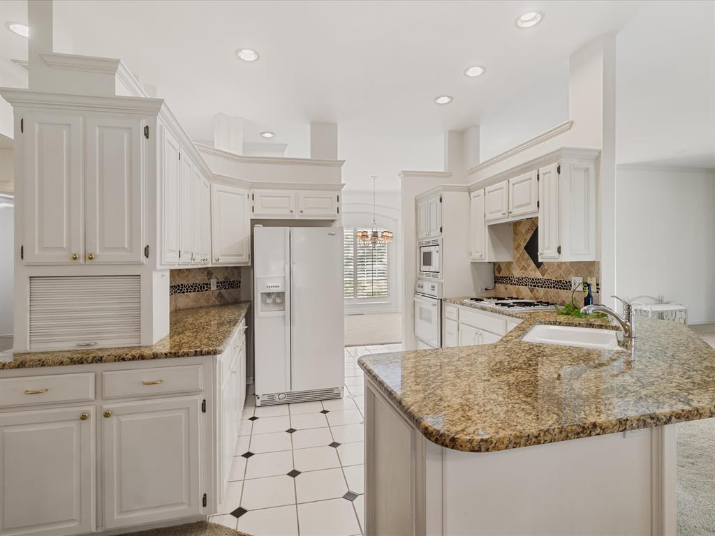 OPEN HOUSE THIS SUNDAY, Nov. 2nd, 2-4 pm.  Come tour this great Norman location with a freshly painted interior!  Nestled within the GATED STEEPLECHASE COMMUNITY, this well-maintained home offers a lifestyle of beauty and neighborly charm. Inside you'll discover a thoughtfully designed interior layout with tons of NATURAL LIGHT, 10-foot ceilings and a seamless flow between dining, kitchen, and living areas. Picture yourself unwinding in the EXPANSIVE PRIMARY SUITE, complete with a Jacuzzi tub, water closet and generous DUAL WALK-IN CLOSETS. With two distinct living areas, casual & formal dining spaces, there's room for everyone to relax and entertain. There are built-ins throughout, including the OFFICE, dining area and the DEN.  Step outside to discover LUSH LANDSCAPING and a sprawling covered back patio, your personal oasis for morning coffee or evening gatherings. Your backyard opens directly to the COMMUNITY POOL – just grab your towel and instant summer fun awaits! Practical features like a GARAGE FLOOR STORM SHELTER and sprinkler system add peace of mind to this truly exceptional home.  Make your appointment to come see this very impressive home!